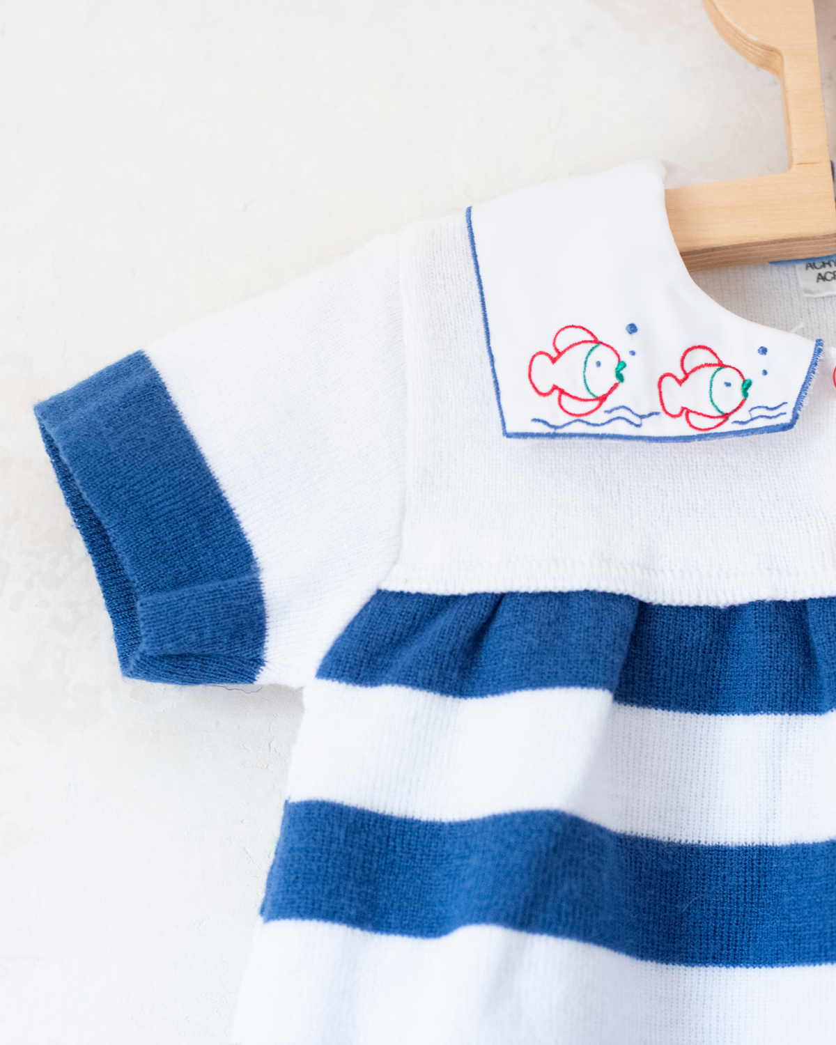 Knitted striped dress with fish on the collar | 9-12 months