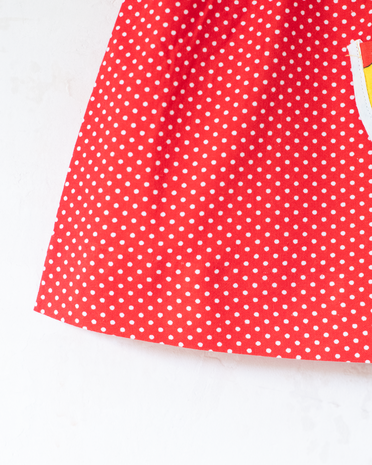 Red tunic from the 70s with apples and flowers | 12-18 months