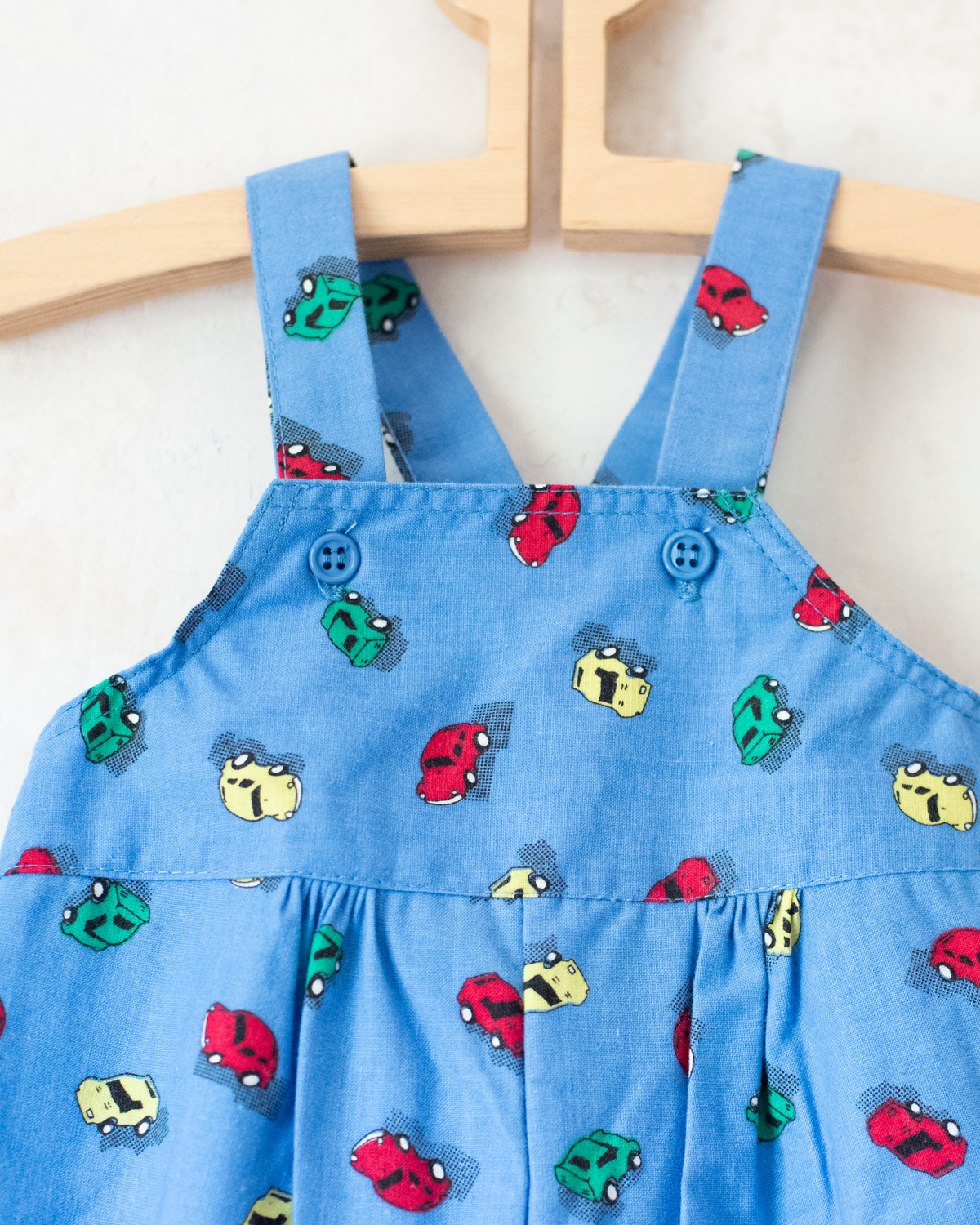 Blue overalls with colorful cars | 12-18 months