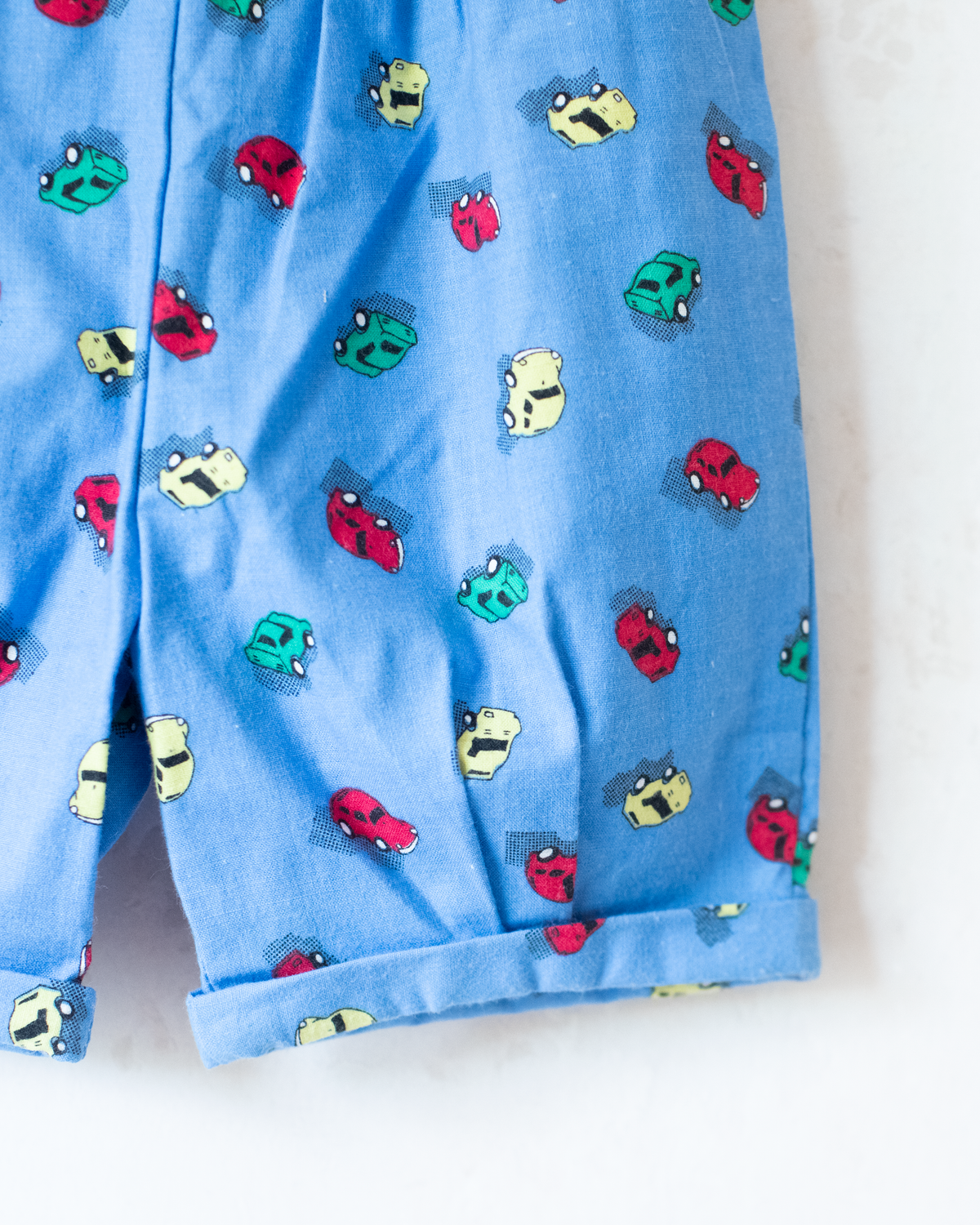 Blue overalls with colorful cars | 12-18 months