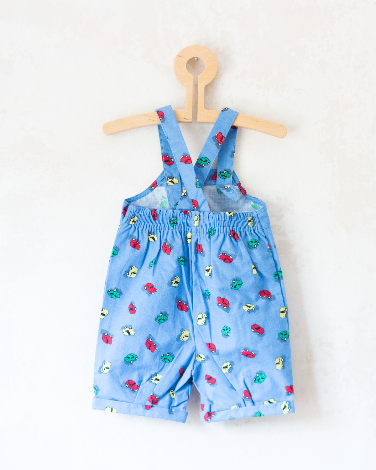 Blue overalls with colorful cars | 12-18 months