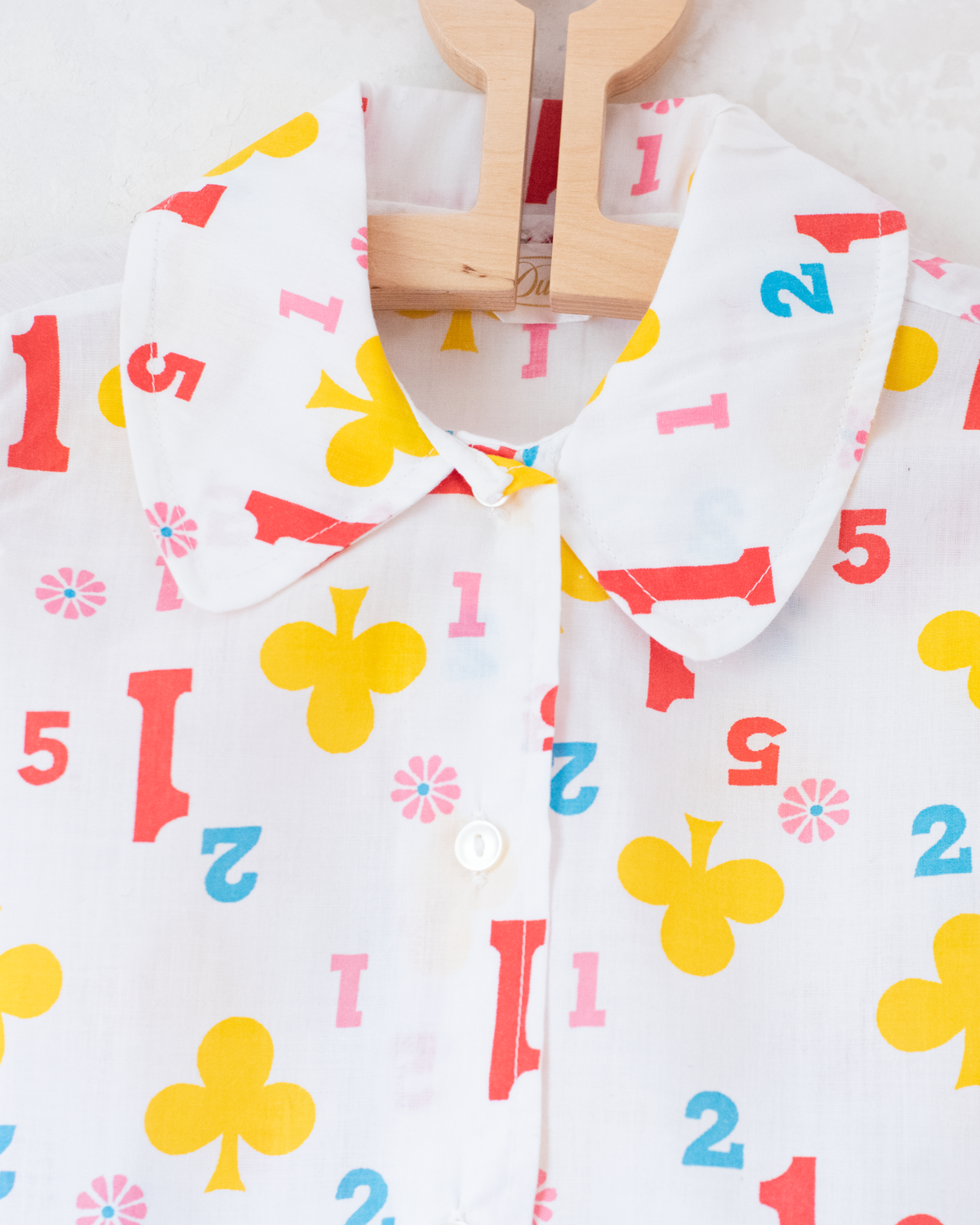 Button-down shirt with shamrocks and numbers | 10-11 years