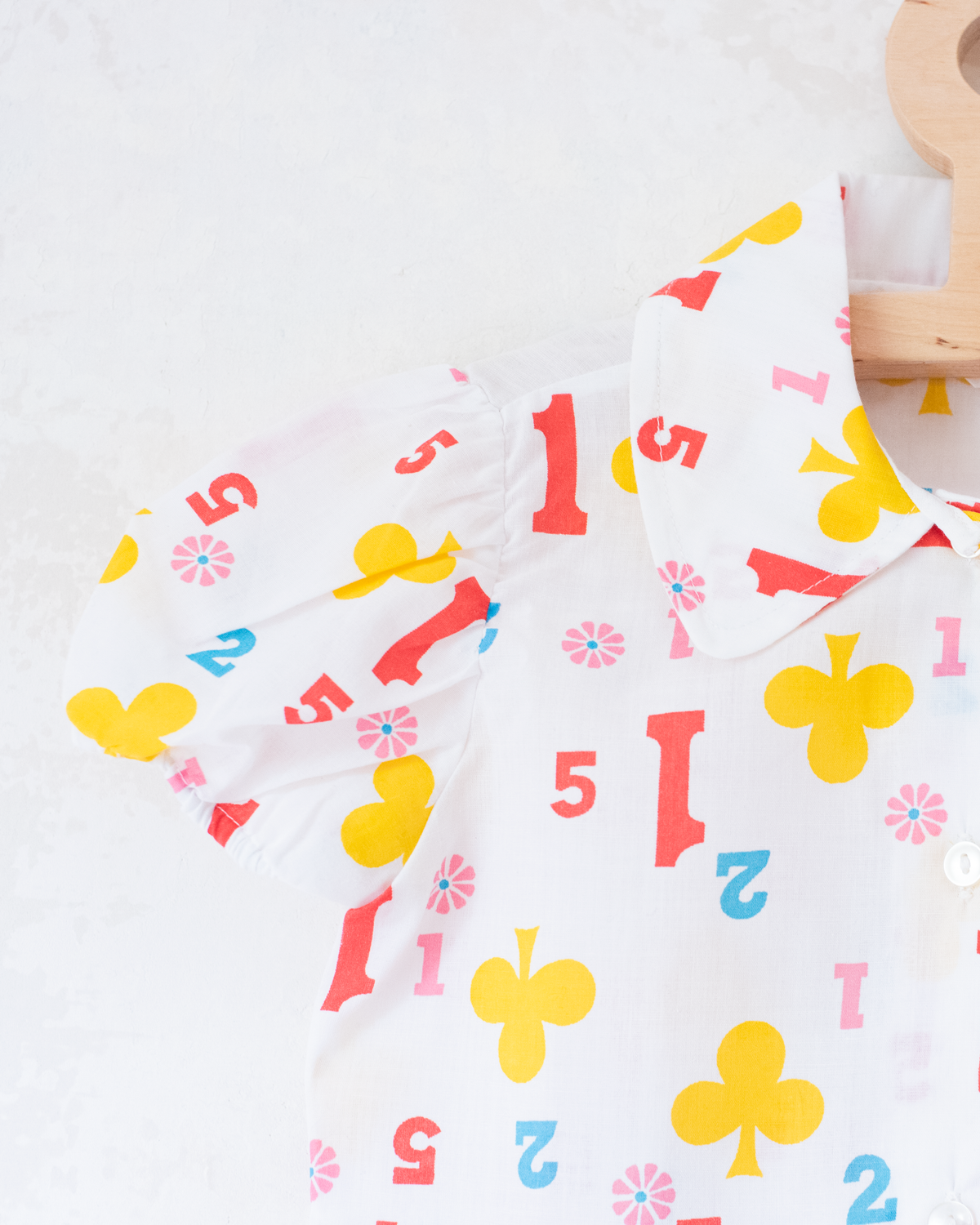 Button-down shirt with shamrocks and numbers | 10-11 years