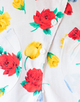 אוברול לבן מהניינטיז עם פרחים צבעוניים | 6-9 חודשים
