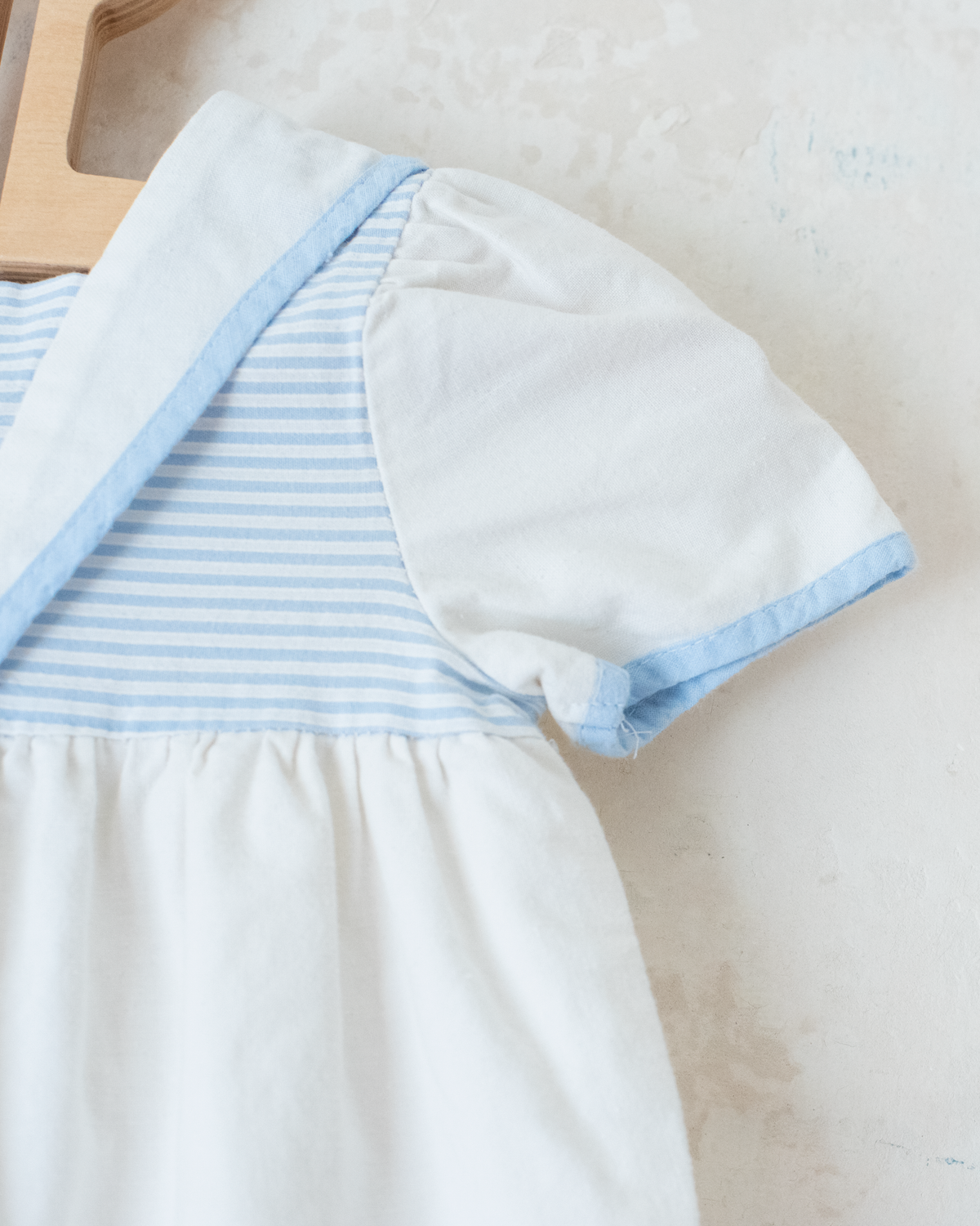 White sailor overalls with a boat embroidered on the leg | 9-12 months