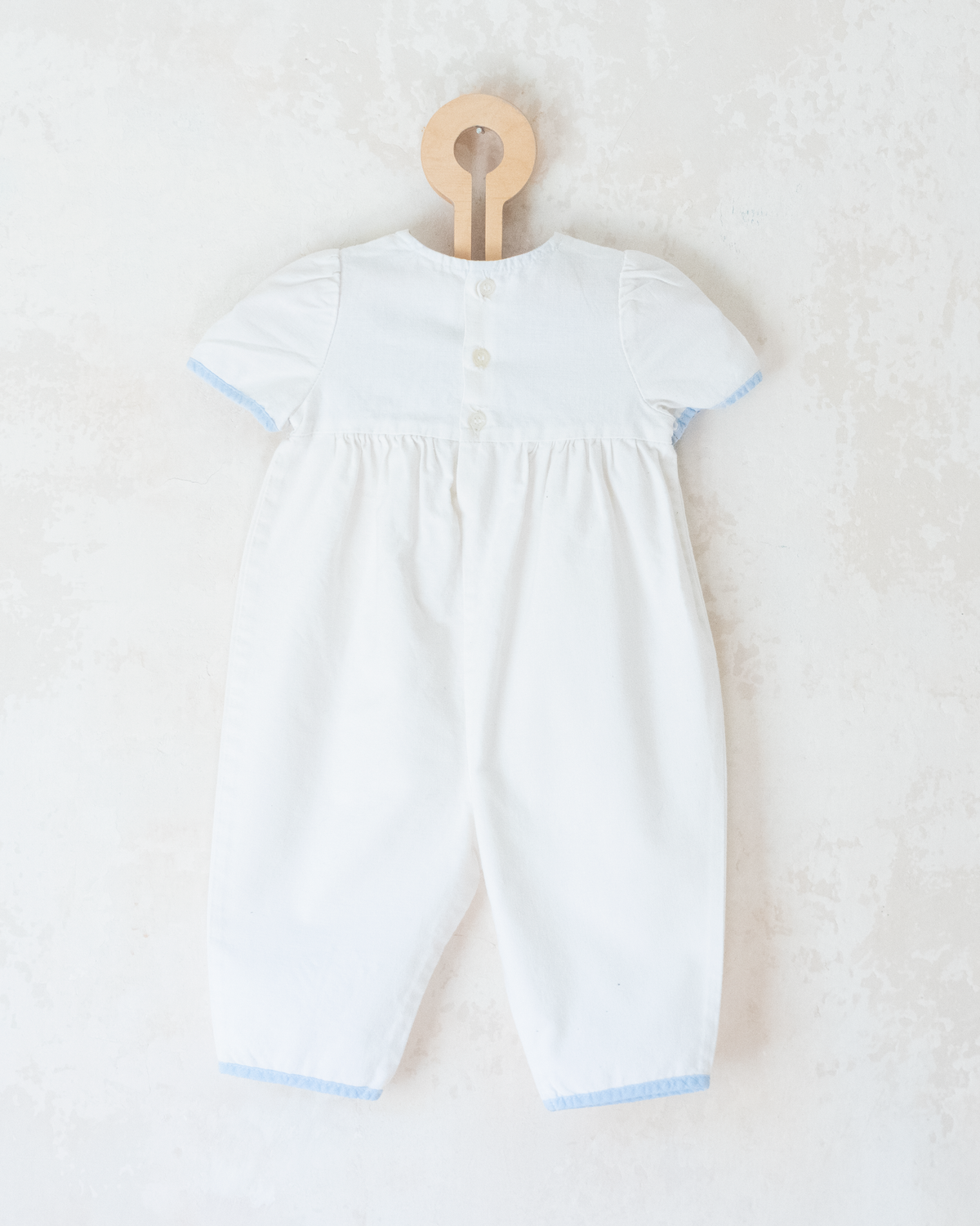 White sailor overalls with a boat embroidered on the leg | 9-12 months