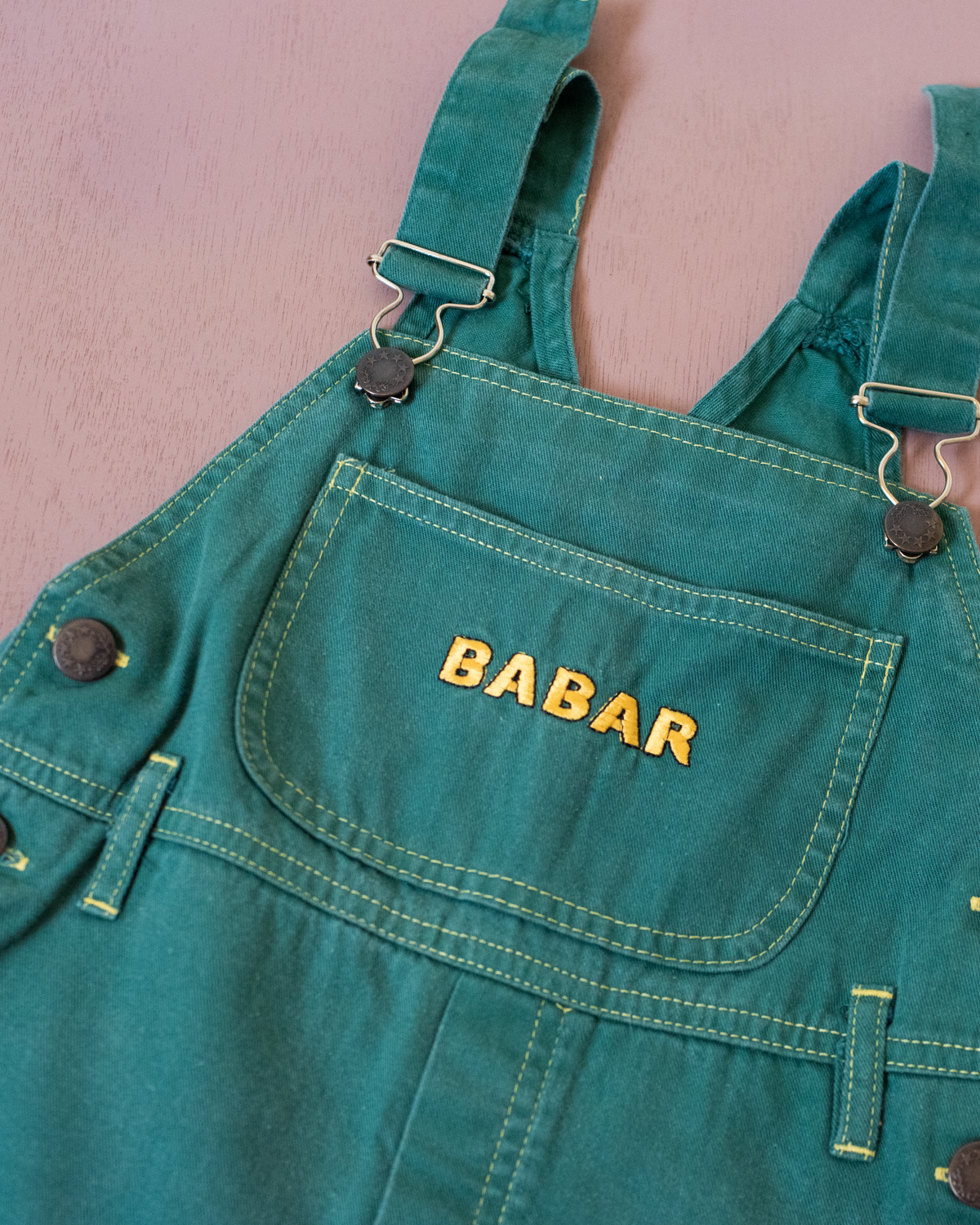Green overall with King Babar in the park | 4-5 years
