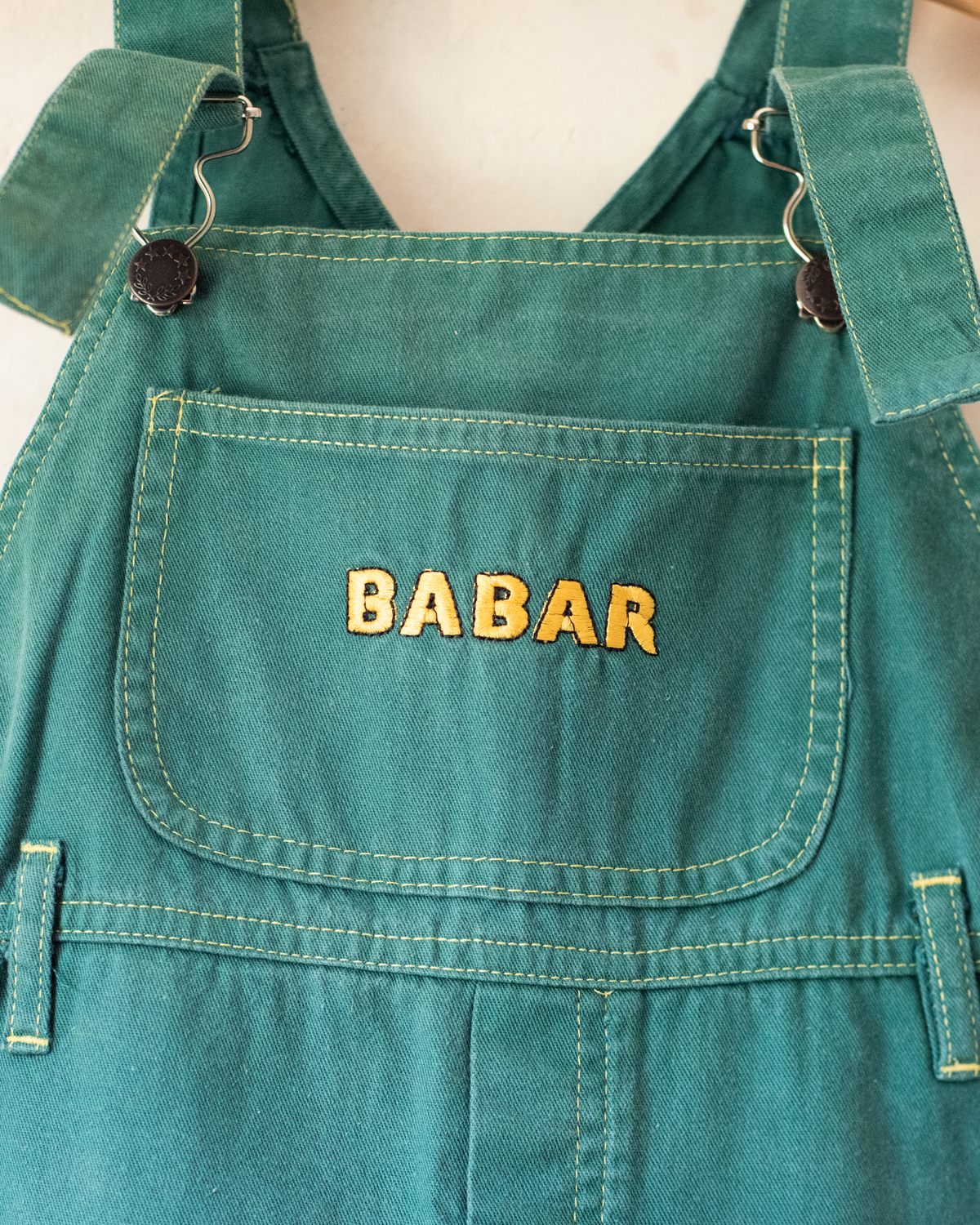 Green overall with King Babar in the park | 4-5 years