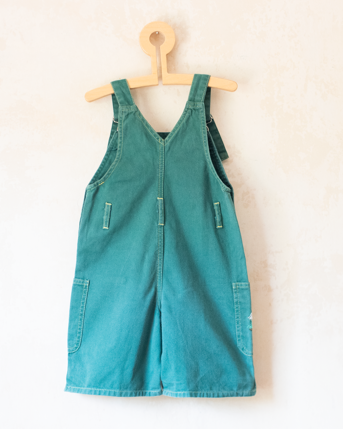 Green overall with King Babar in the park | 4-5 years
