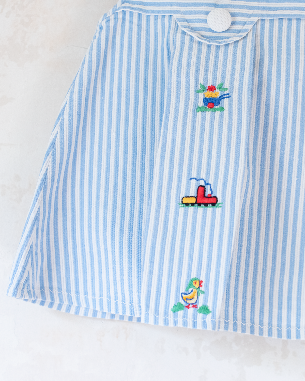 Tunic with stripes and colorful embroidery | 9-12 months