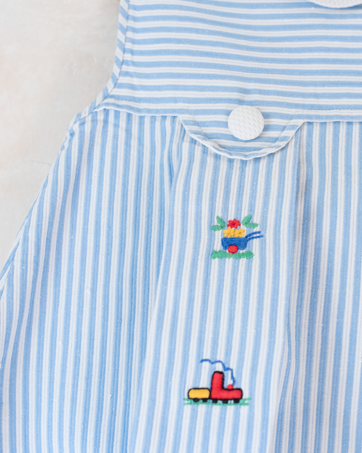 Tunic with stripes and colorful embroidery | 9-12 months