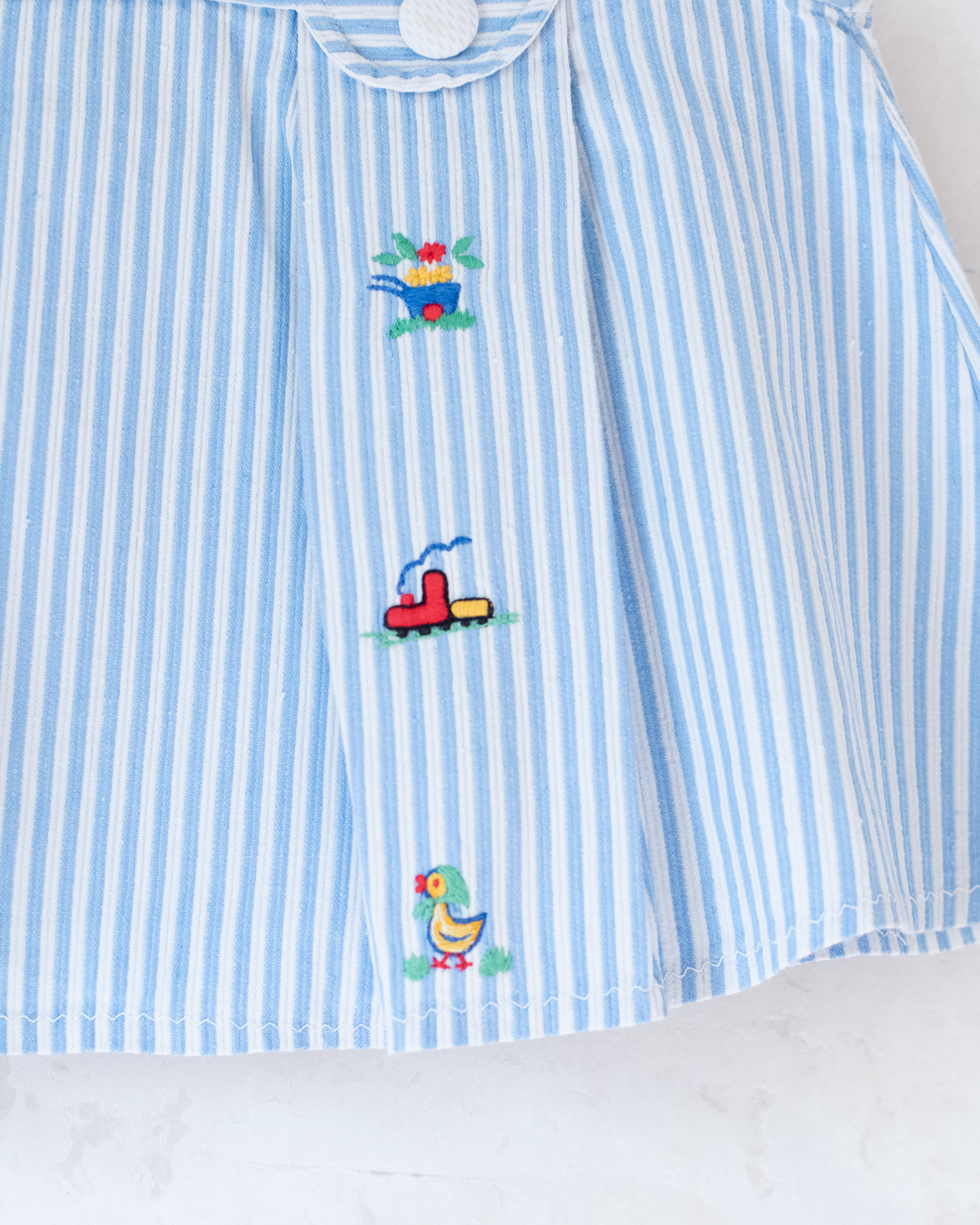 Tunic with stripes and colorful embroidery | 9-12 months