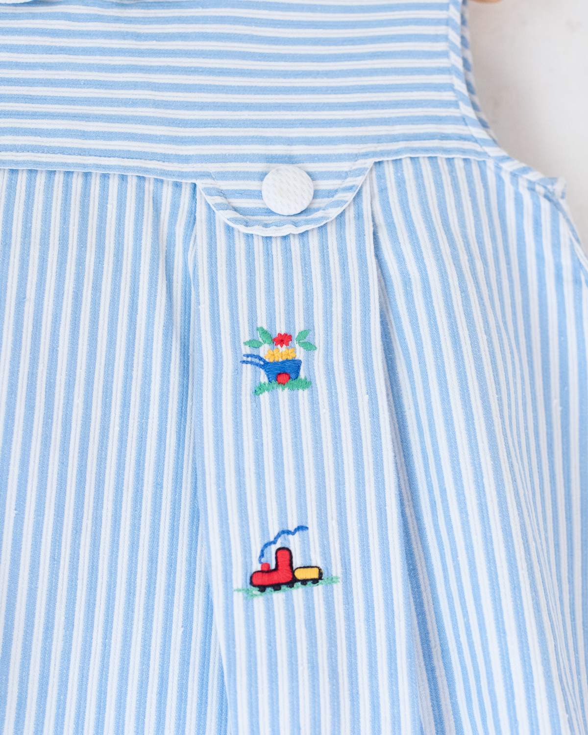 Tunic with stripes and colorful embroidery | 9-12 months