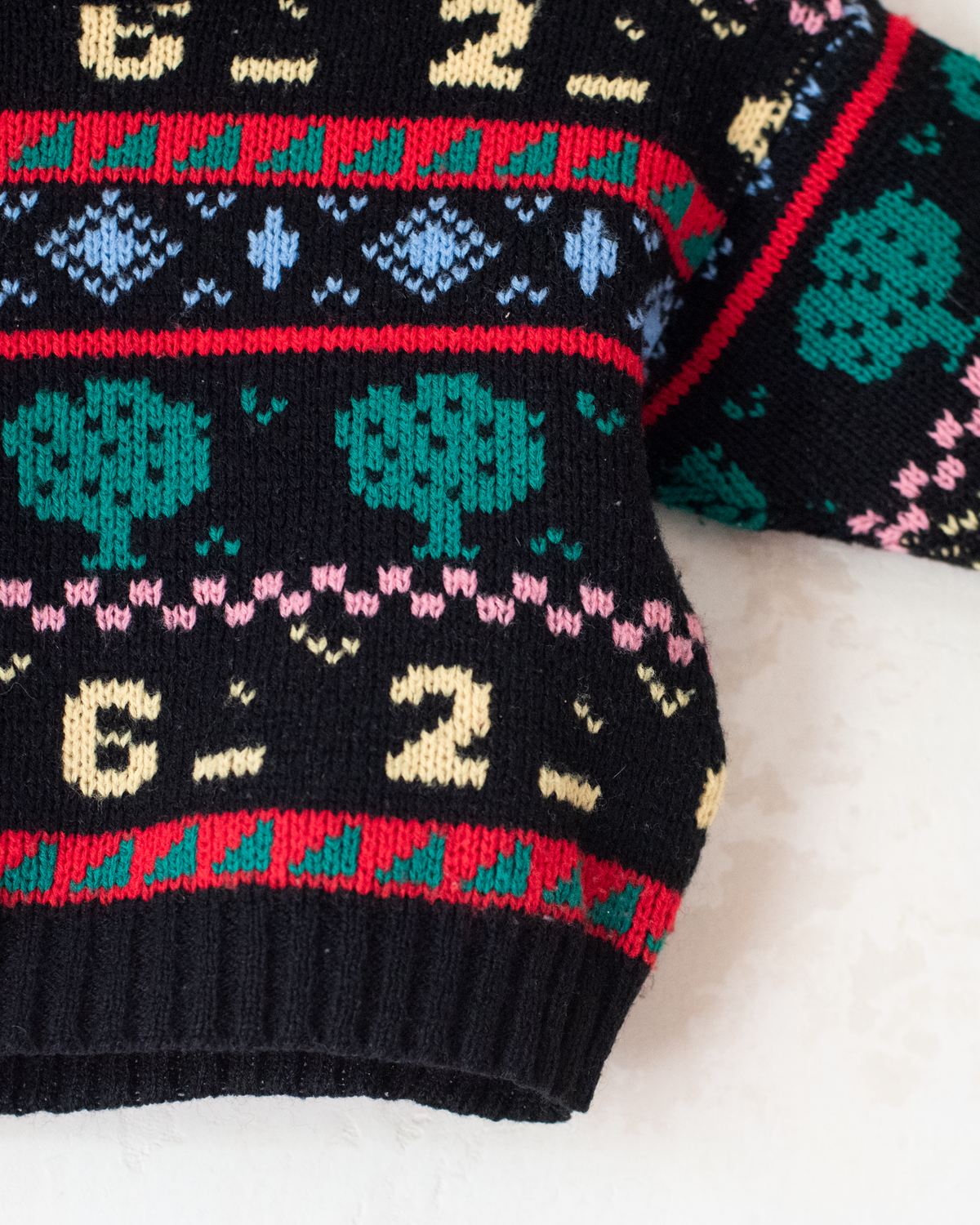 Black sweater with trees, numbers and shapes | 3-6 months