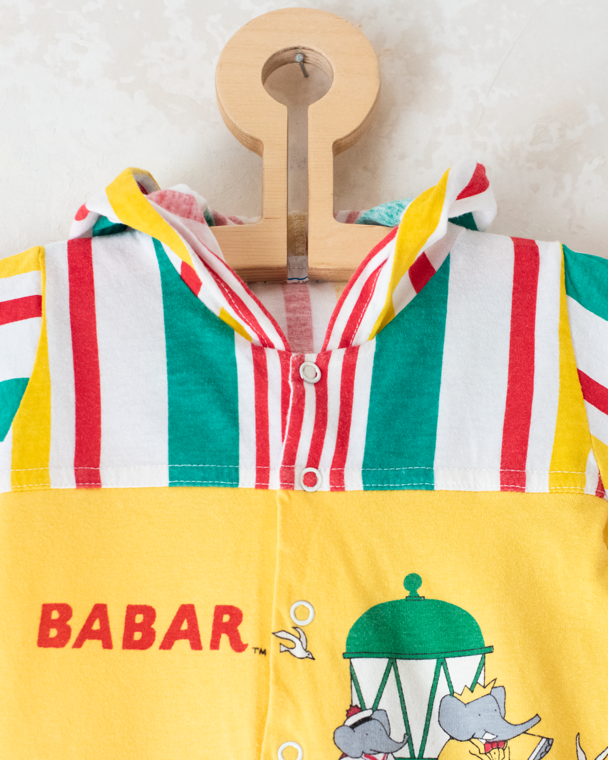 Colorful overall with King Babar and a hood | 3-6 months