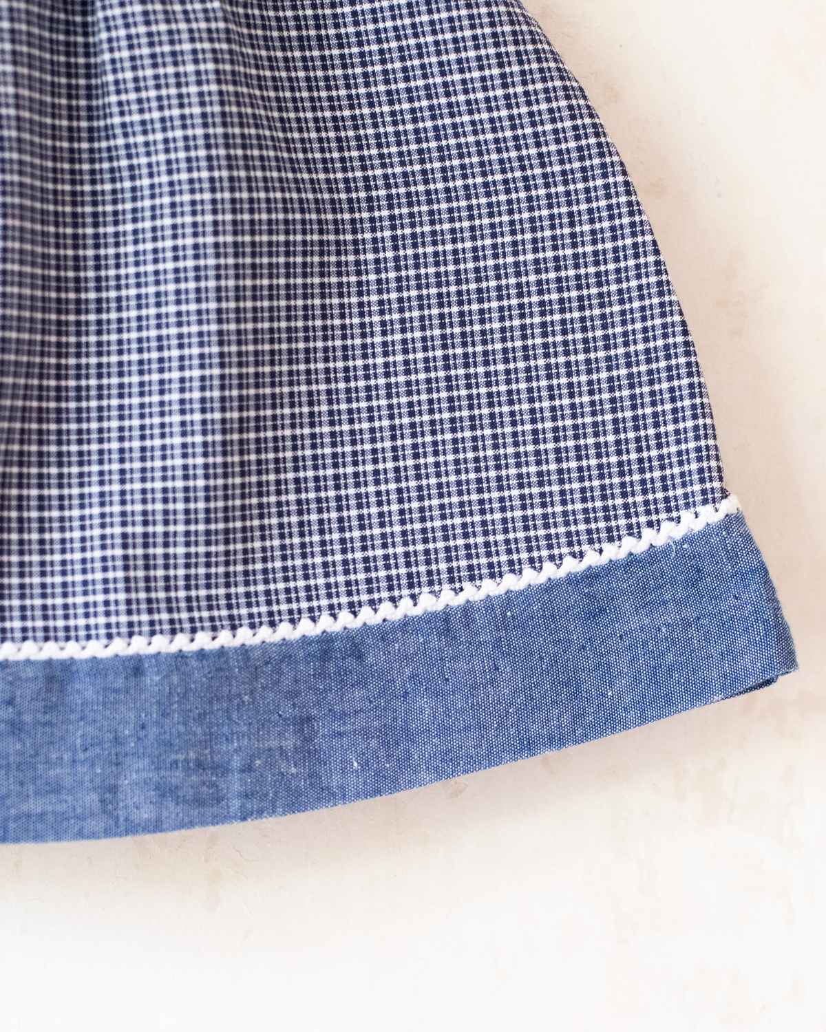 Blue plaid dress with embroidery of a girl and two ducks | 3-6 months
