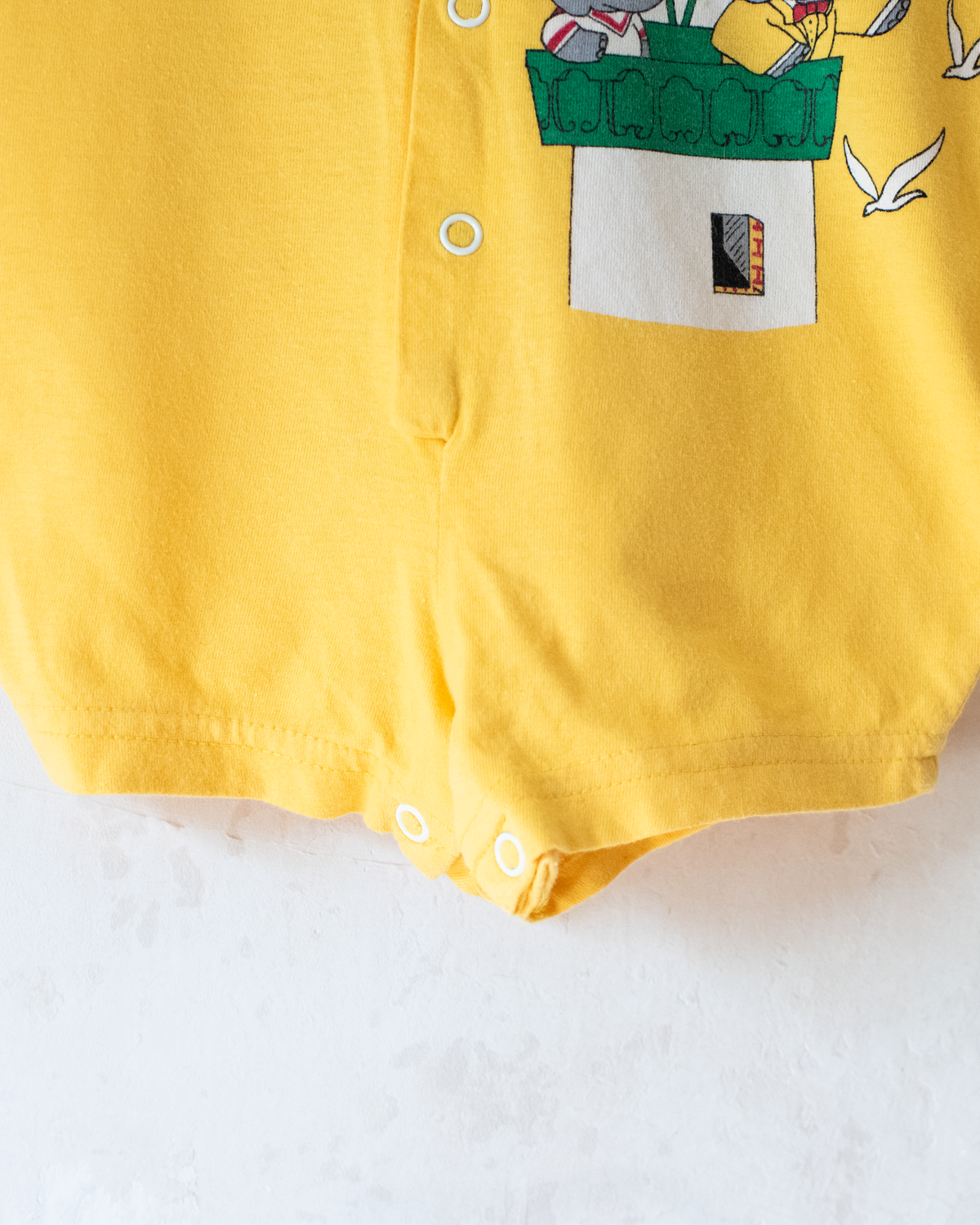 Colorful overall with King Babar and a hood | 3-6 months
