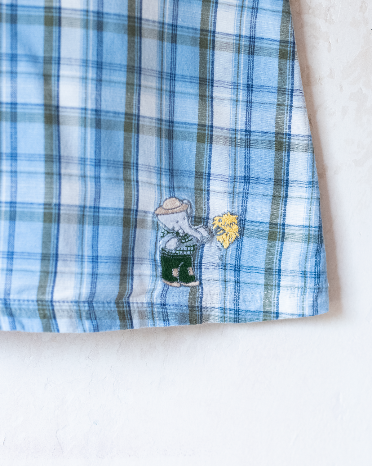 Plaid dress with King Babar embroidery and a haystack | 4-5 years