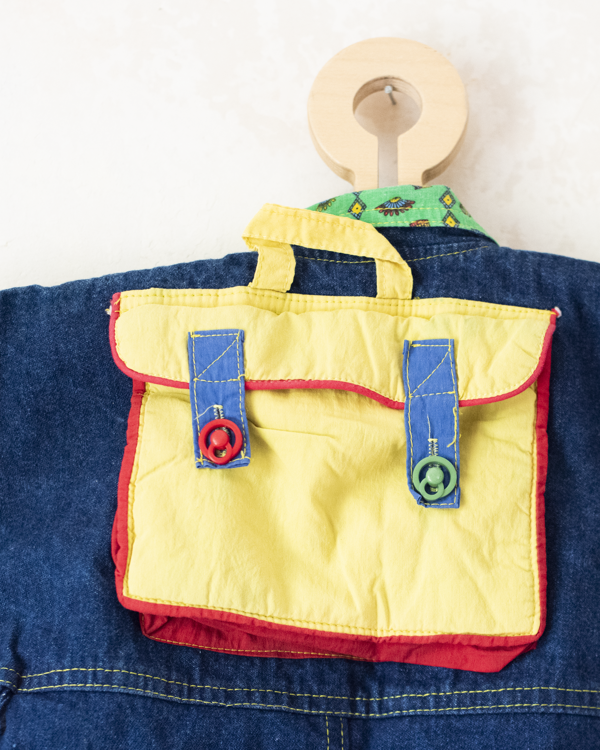 אוברול ג׳ינס מהאייטיז עם תיק בגב | 3-6 חודשים