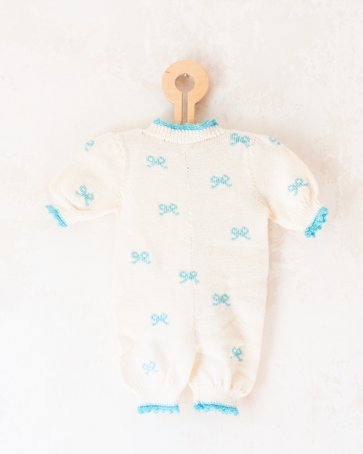 White knitted overalls with bow ties | 6-9 months