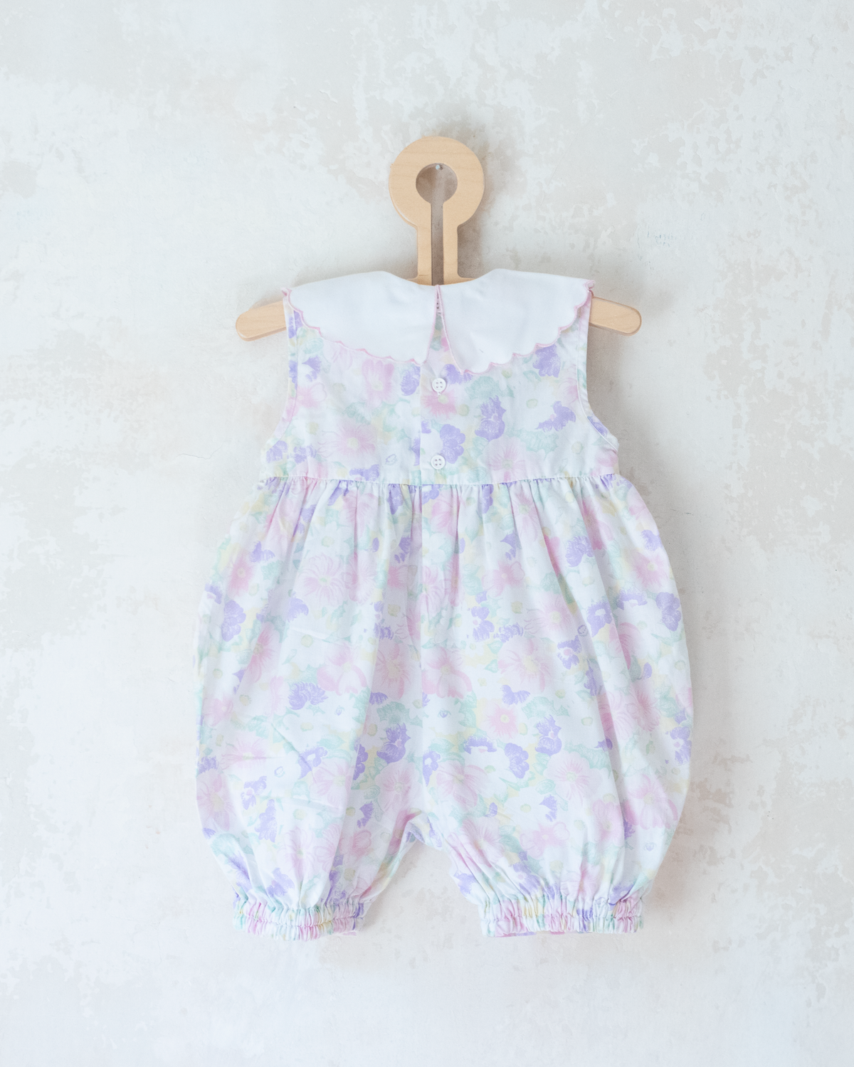 Bright floral jumpsuit with embroidered collar | 9-12 months
