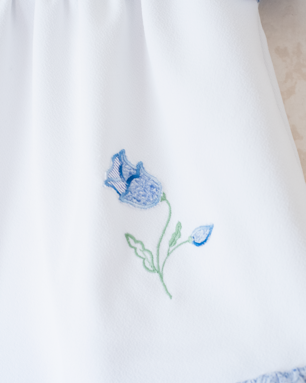 White dress with blue rose | 9-12 months