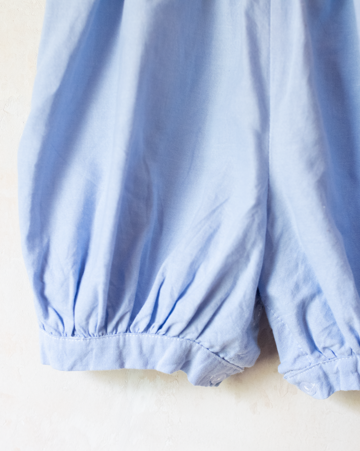 Sky blue overalls with embroidered boats | 12-18 months