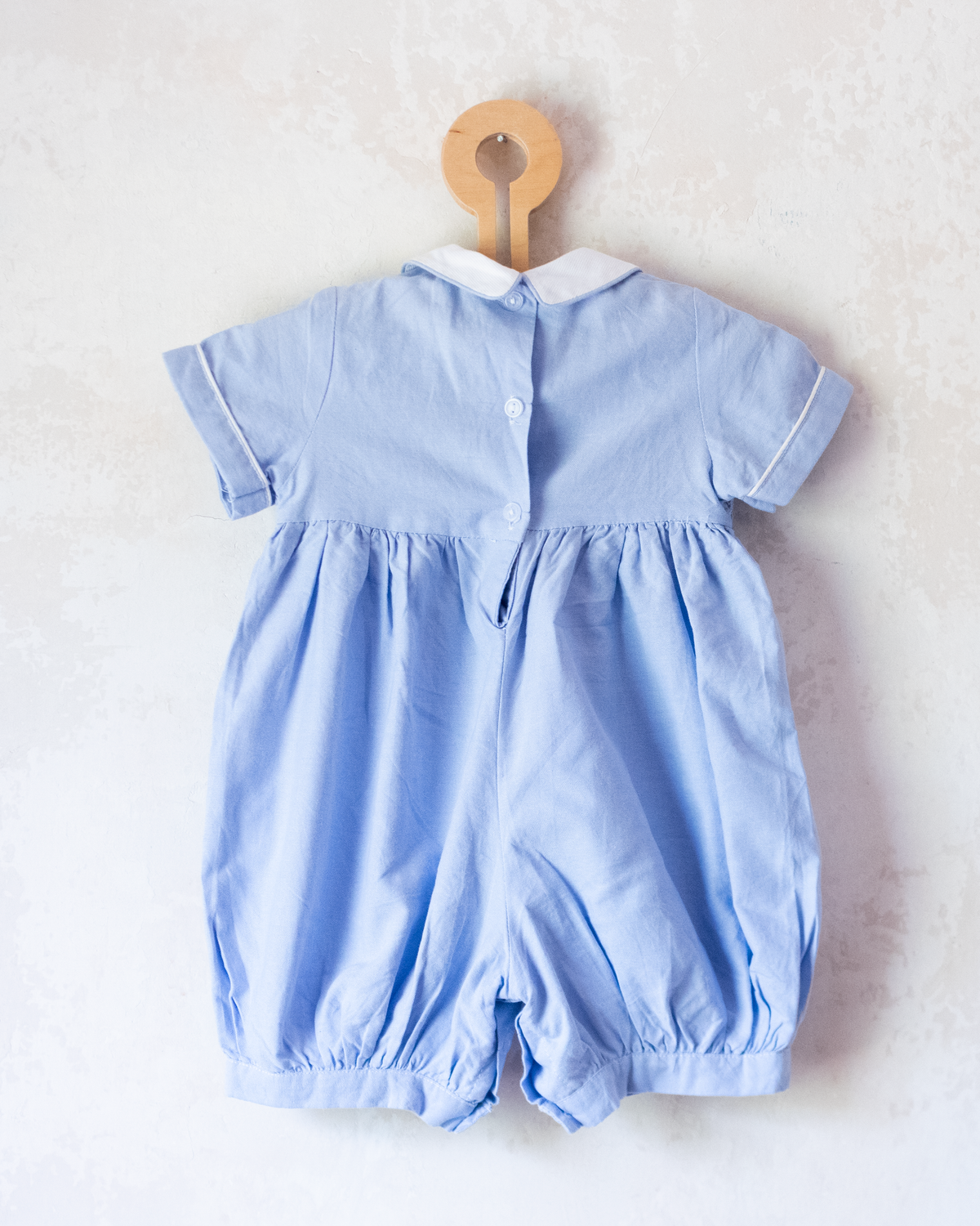 Sky blue overalls with embroidered boats | 12-18 months
