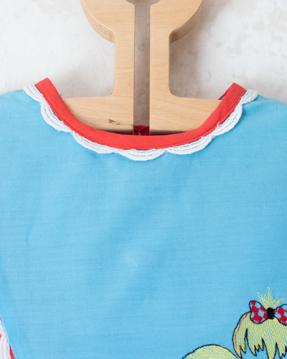 Red and light blue dress with embroidered children | 9-12 months