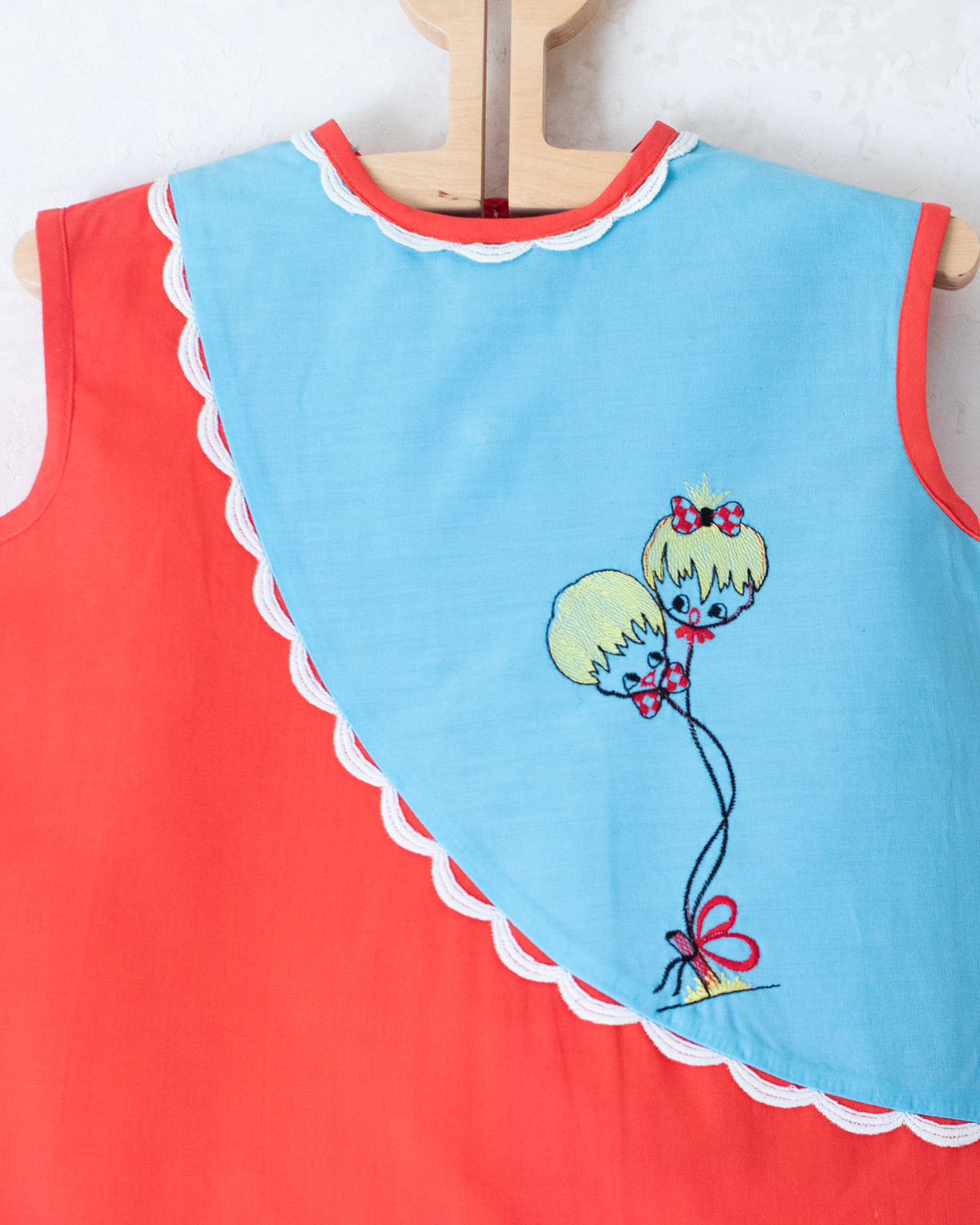 Red and light blue dress with embroidered children | 9-12 months