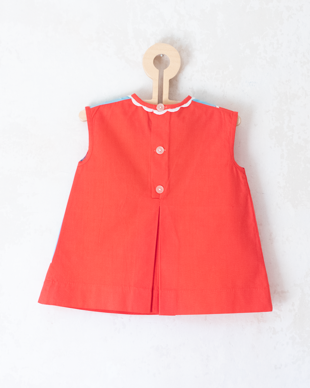 Red and light blue dress with embroidered children | 9-12 months