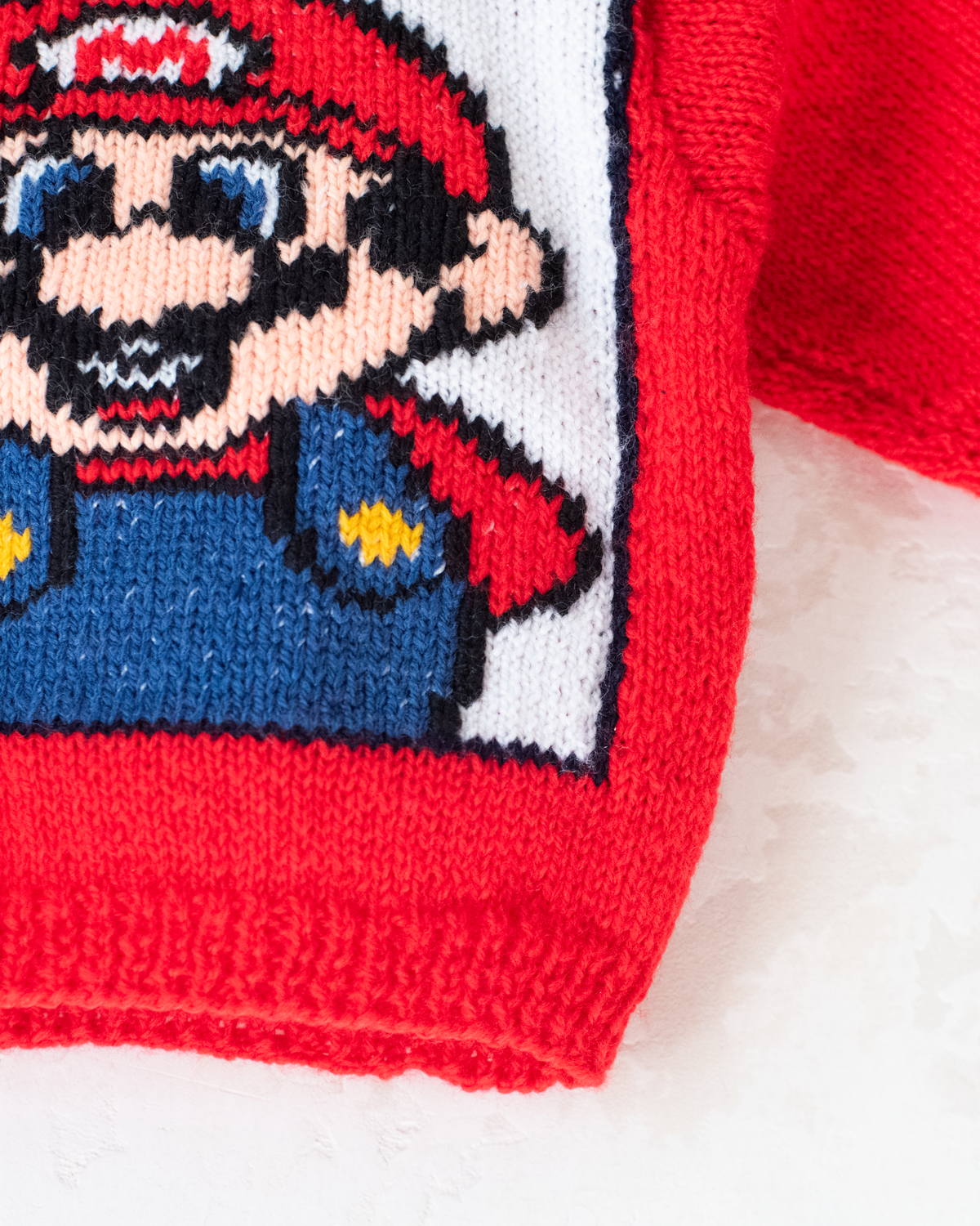Red wool sweater with Super Mario | 6-9 months