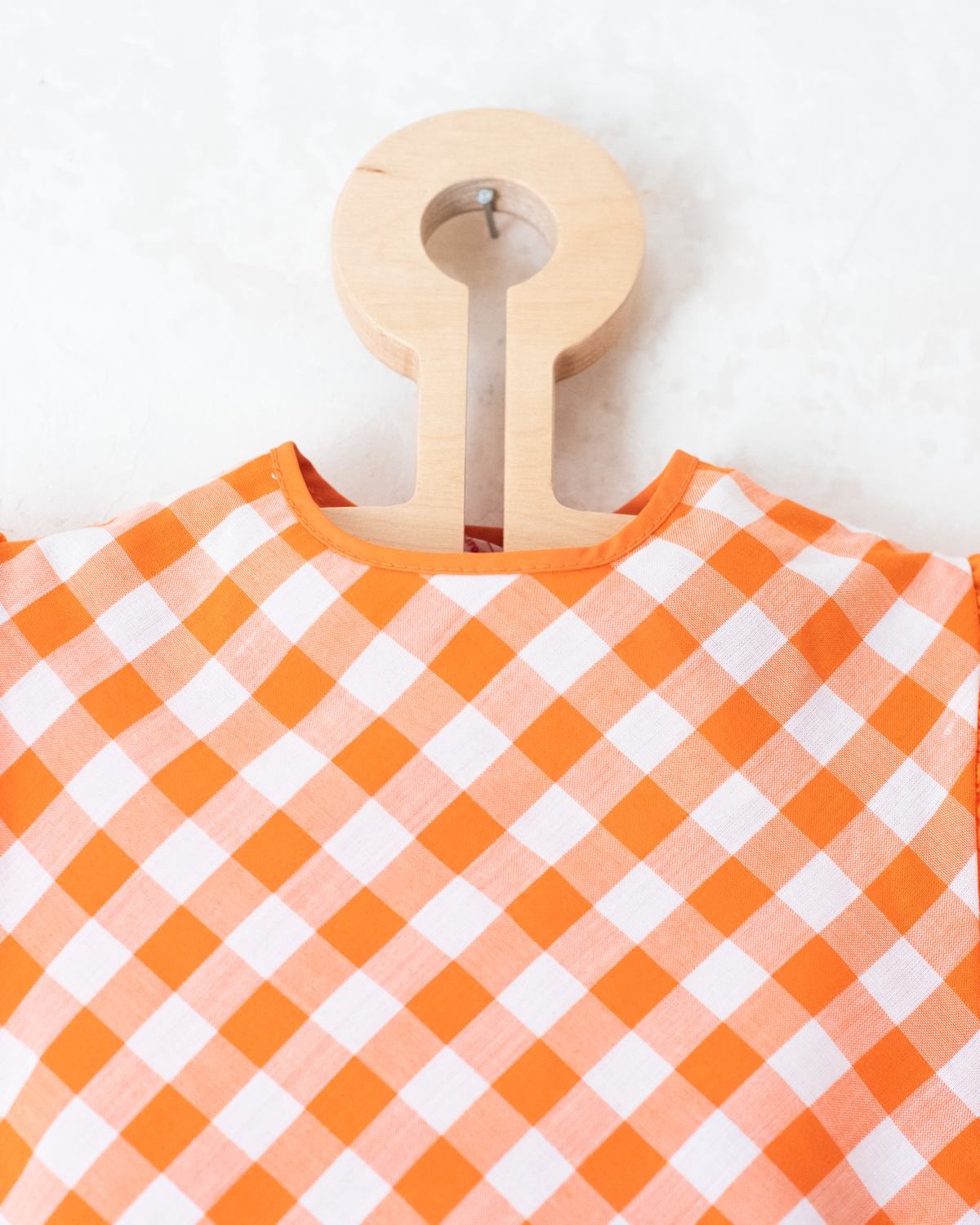 Orange and white checkered tank top with big heart | 9-12 months