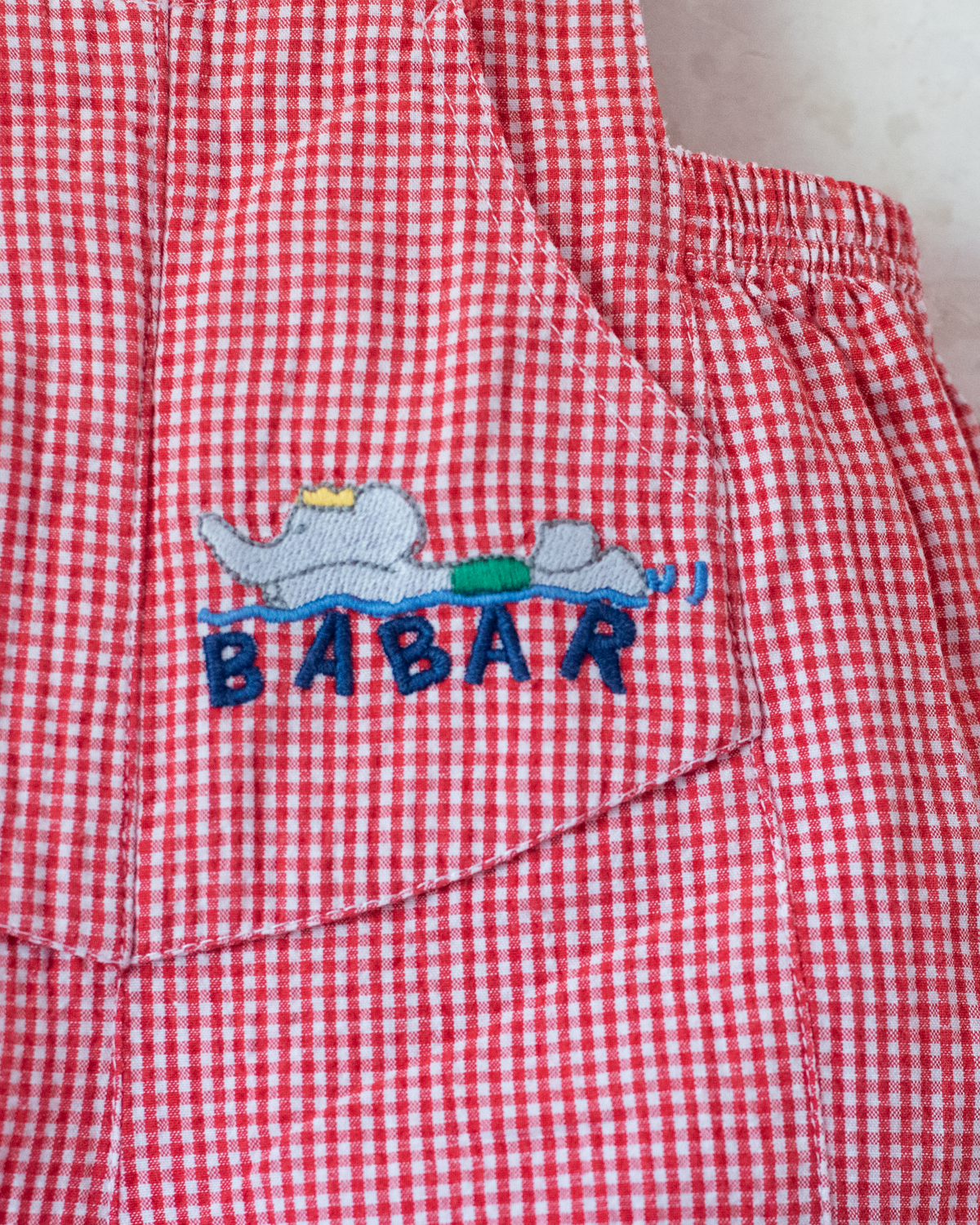 Plaid overall with Babar the King swimming embroidery | 6-9 months