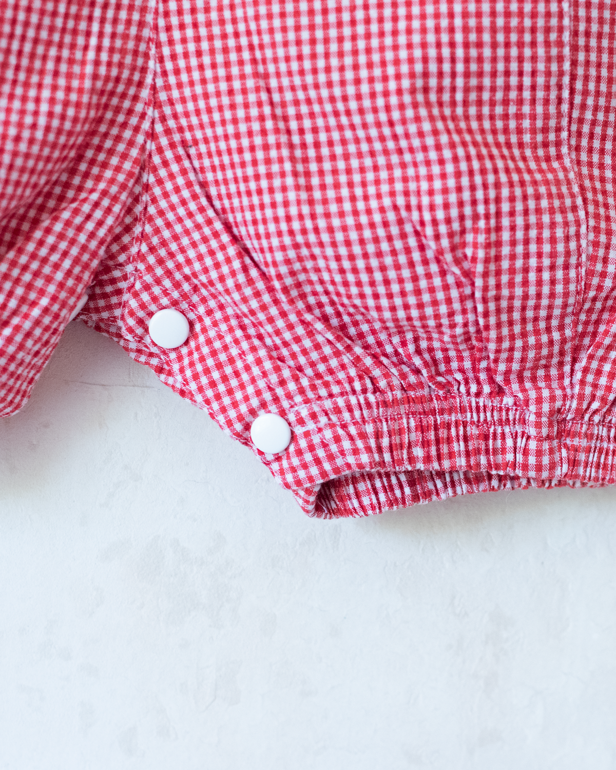 Plaid overall with Babar the King swimming embroidery | 6-9 months
