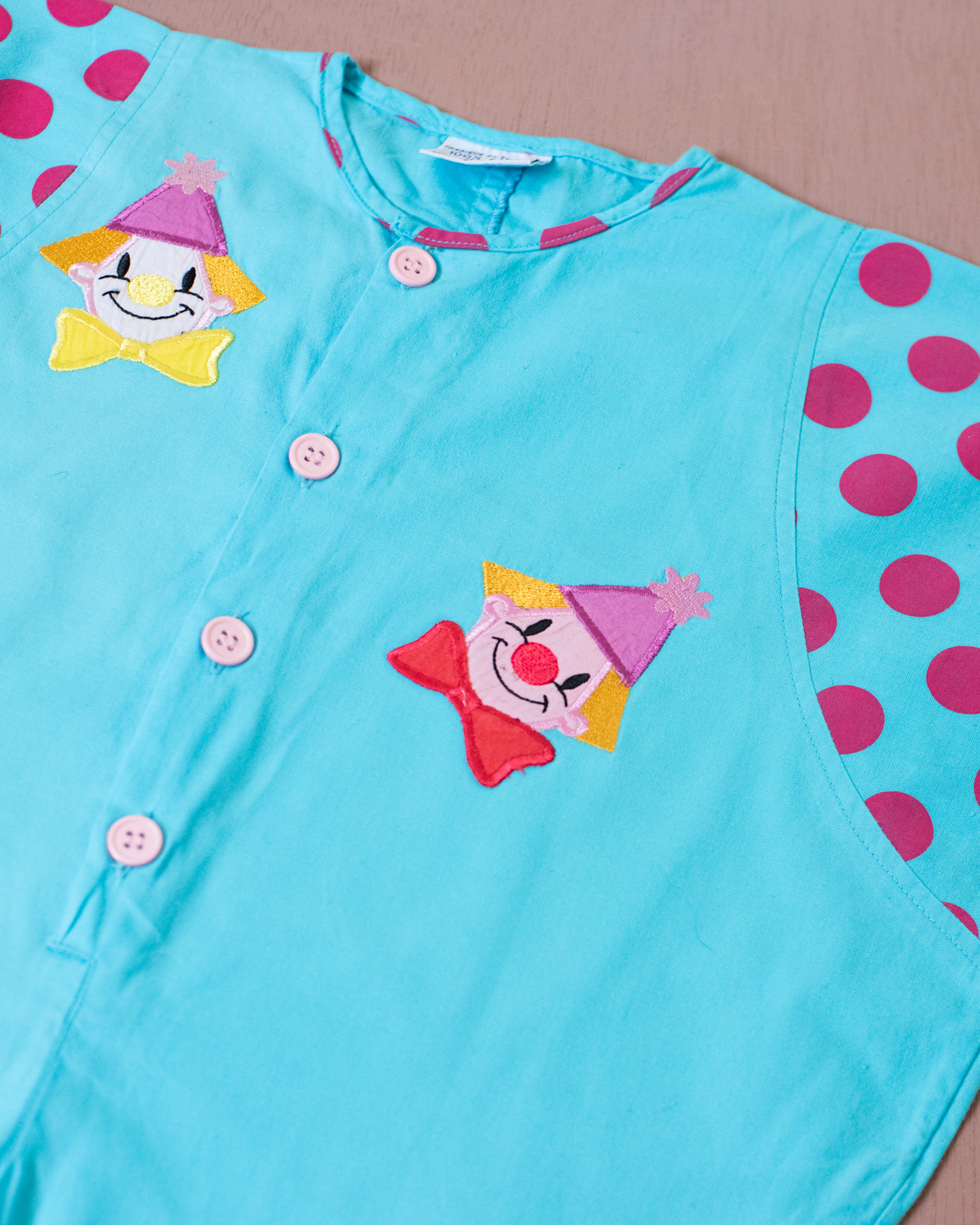 Light blue onesie with dots and clowns | 12-18 months