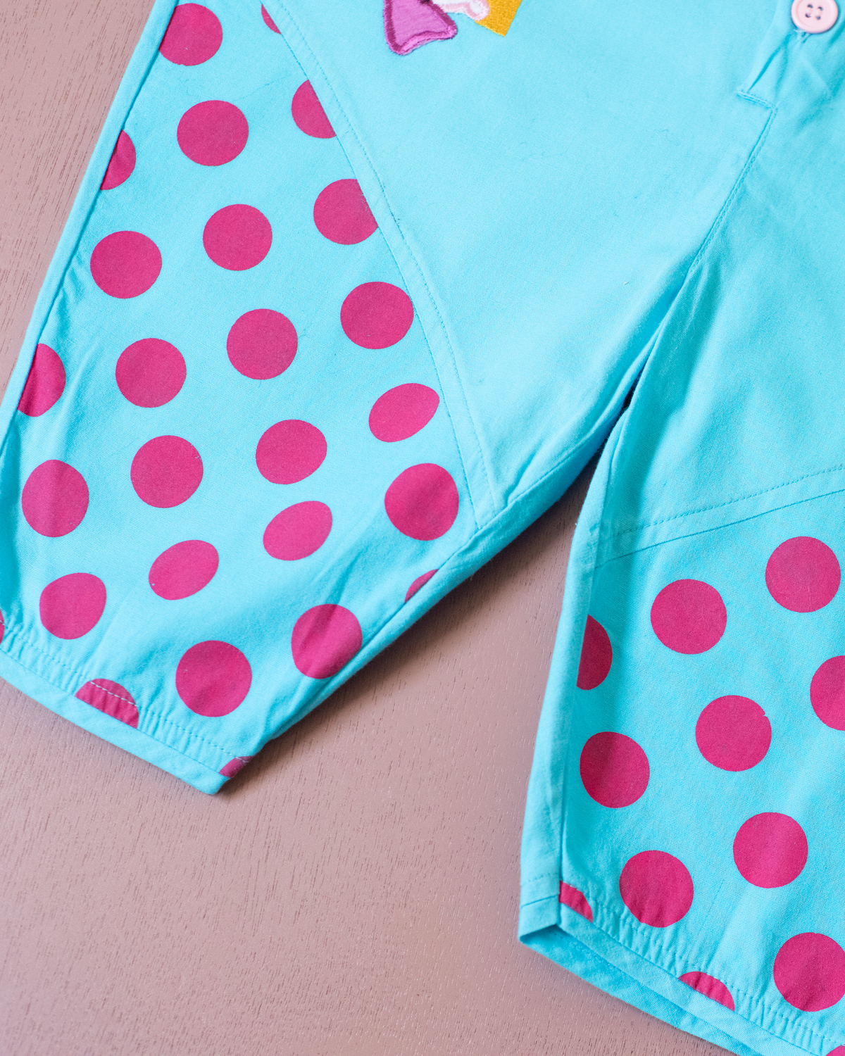 Light blue onesie with dots and clowns | 12-18 months