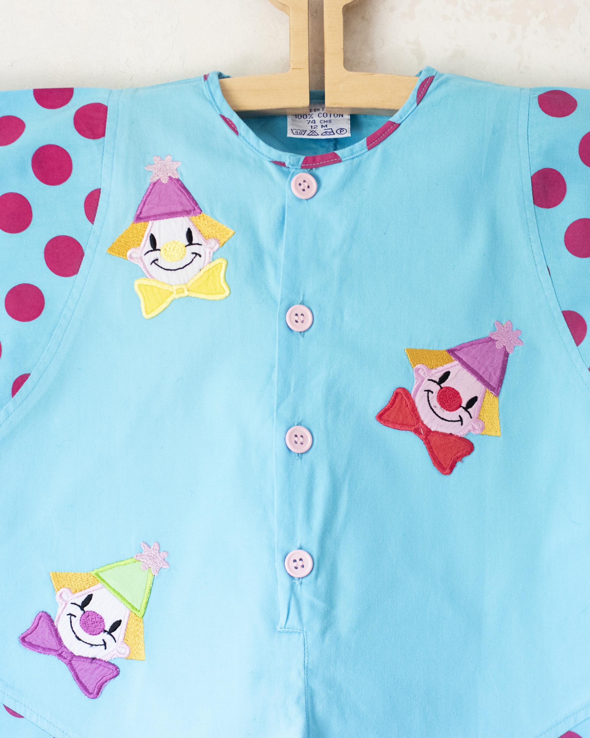 אוברול תכלת עם נקודות וליצנים | 12-18 חודשים