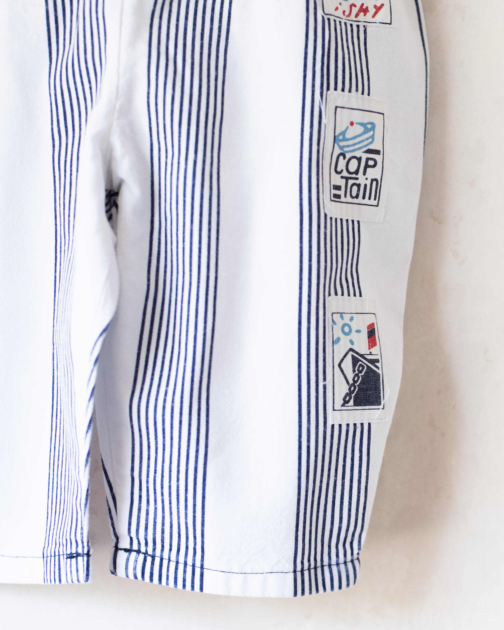 אוברול פסים וכפתורי דגים | 12-18 חודשים