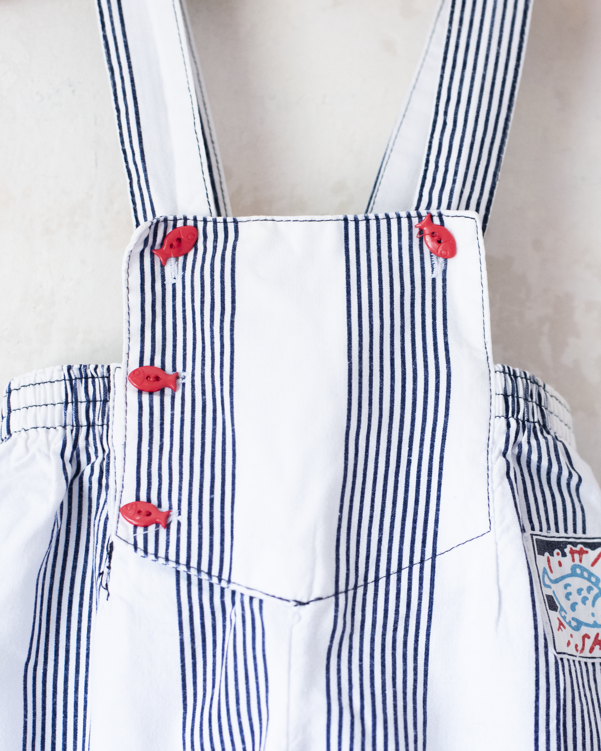 אוברול פסים וכפתורי דגים | 12-18 חודשים