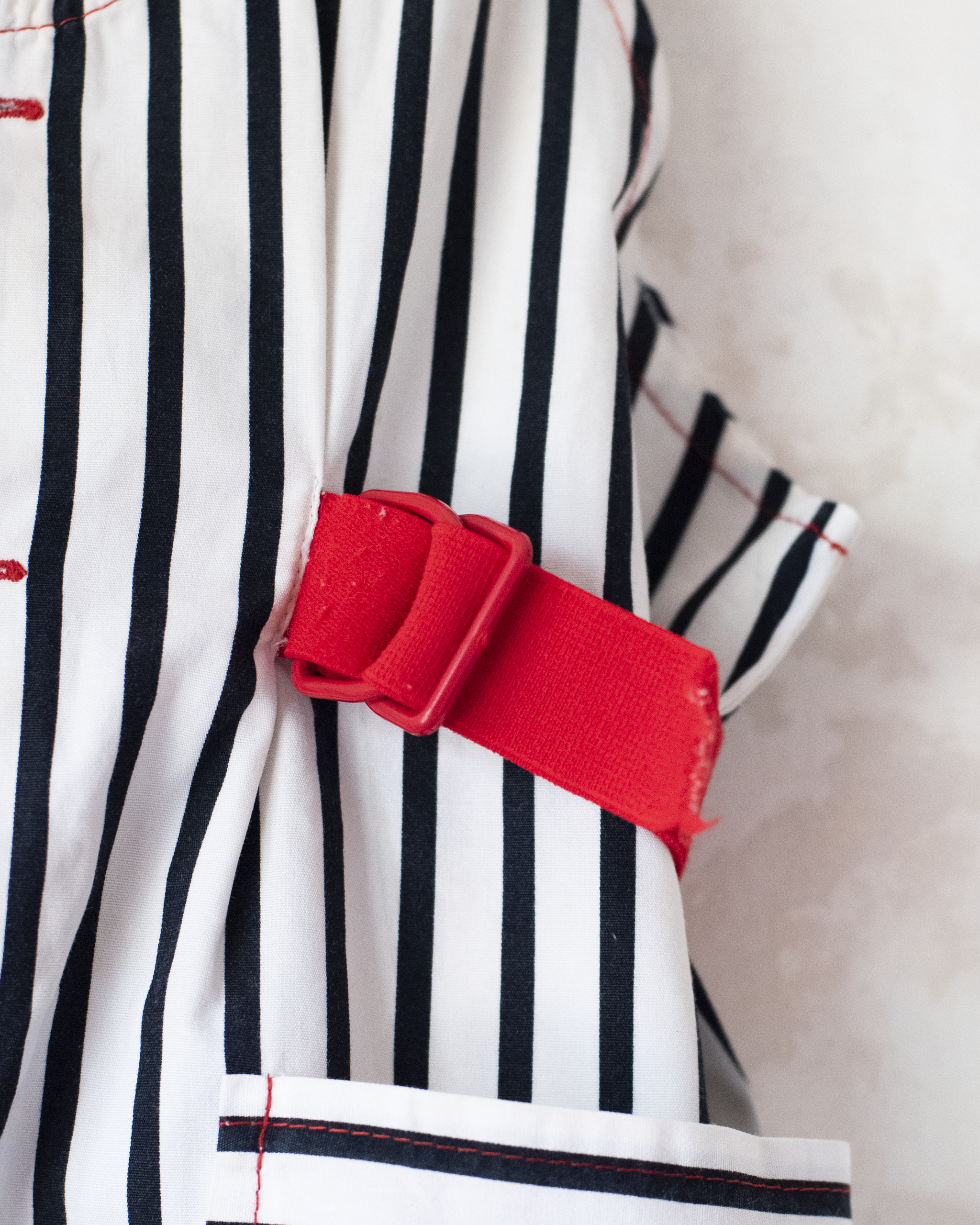 אוברול עם פסים מבית איב סאן לורן | 12-18 חודשים