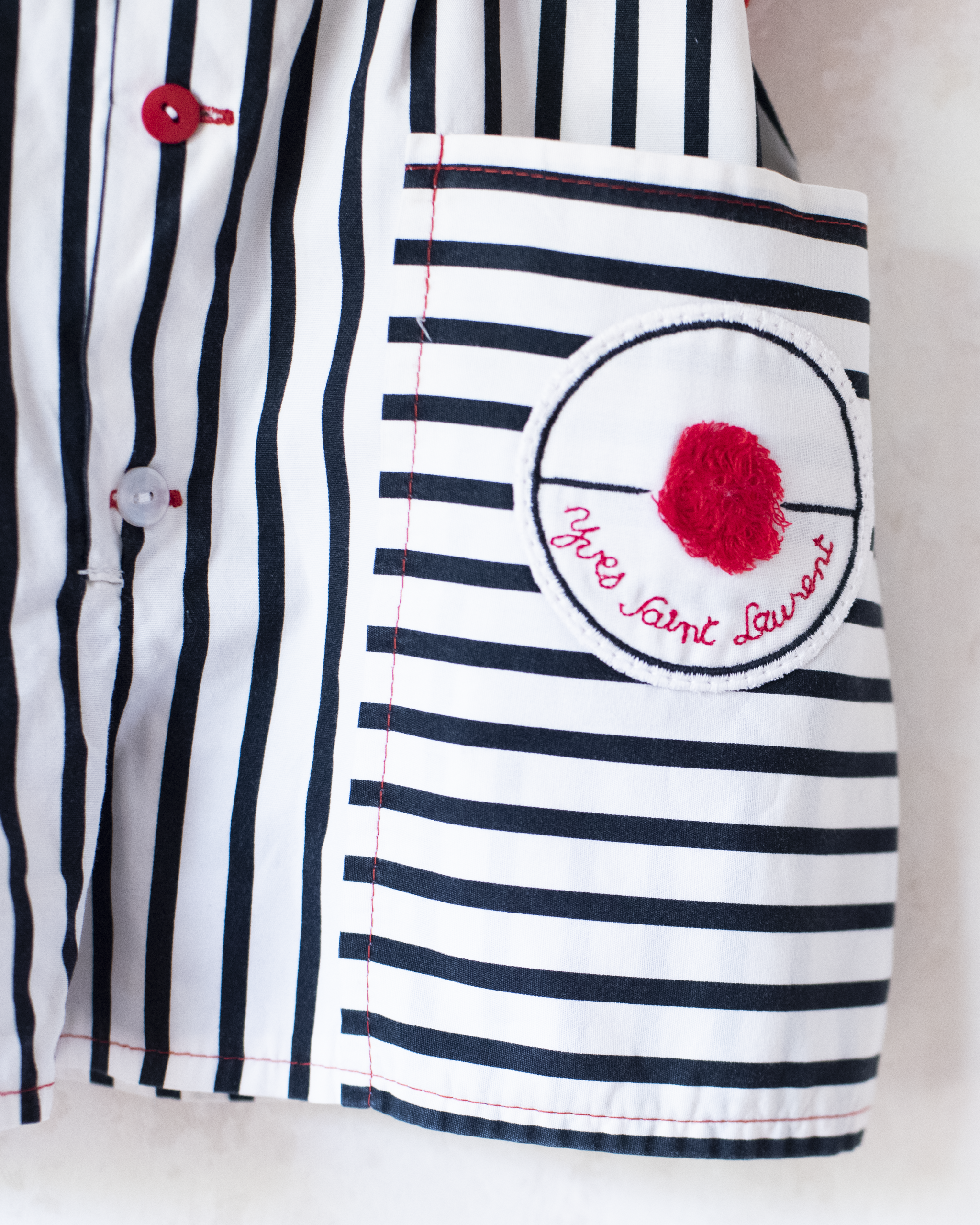 אוברול עם פסים מבית איב סאן לורן | 12-18 חודשים