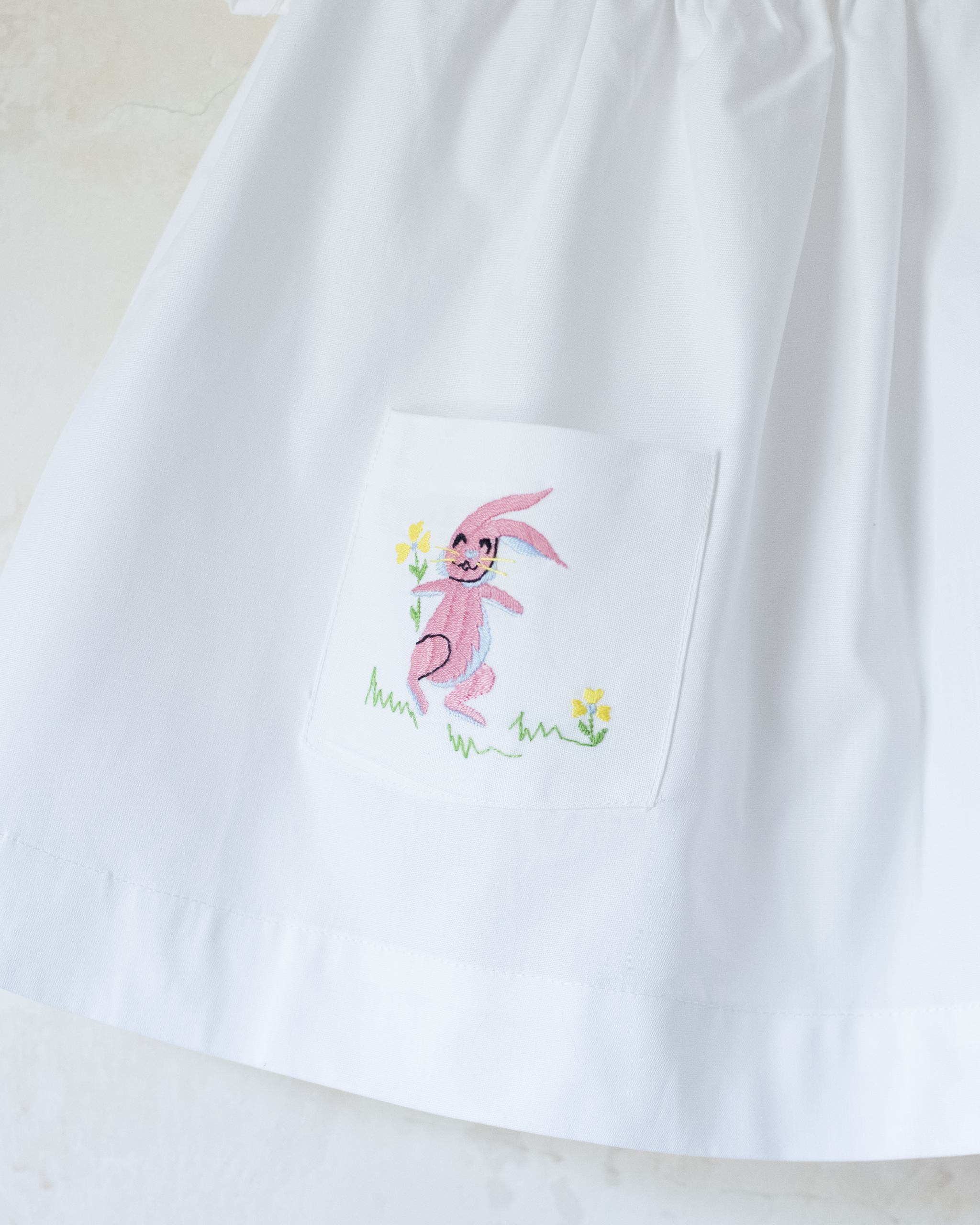 טוניקה לבנה עם שפן ורוד רקום | דד סטוק איטלקי | 18-24 חודשים