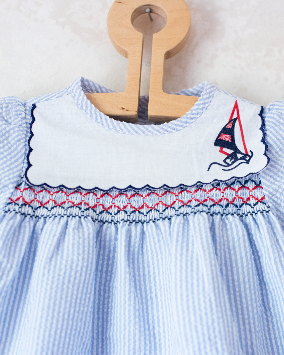 Striped dress with a collar and a sailboat | 6-9 months