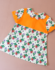 שמלה כתומה עם פירות יער | 9-12 חודשים