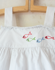 טוניקה צרפתית לבנה עם דגים רקומים | 9-18 חודשים