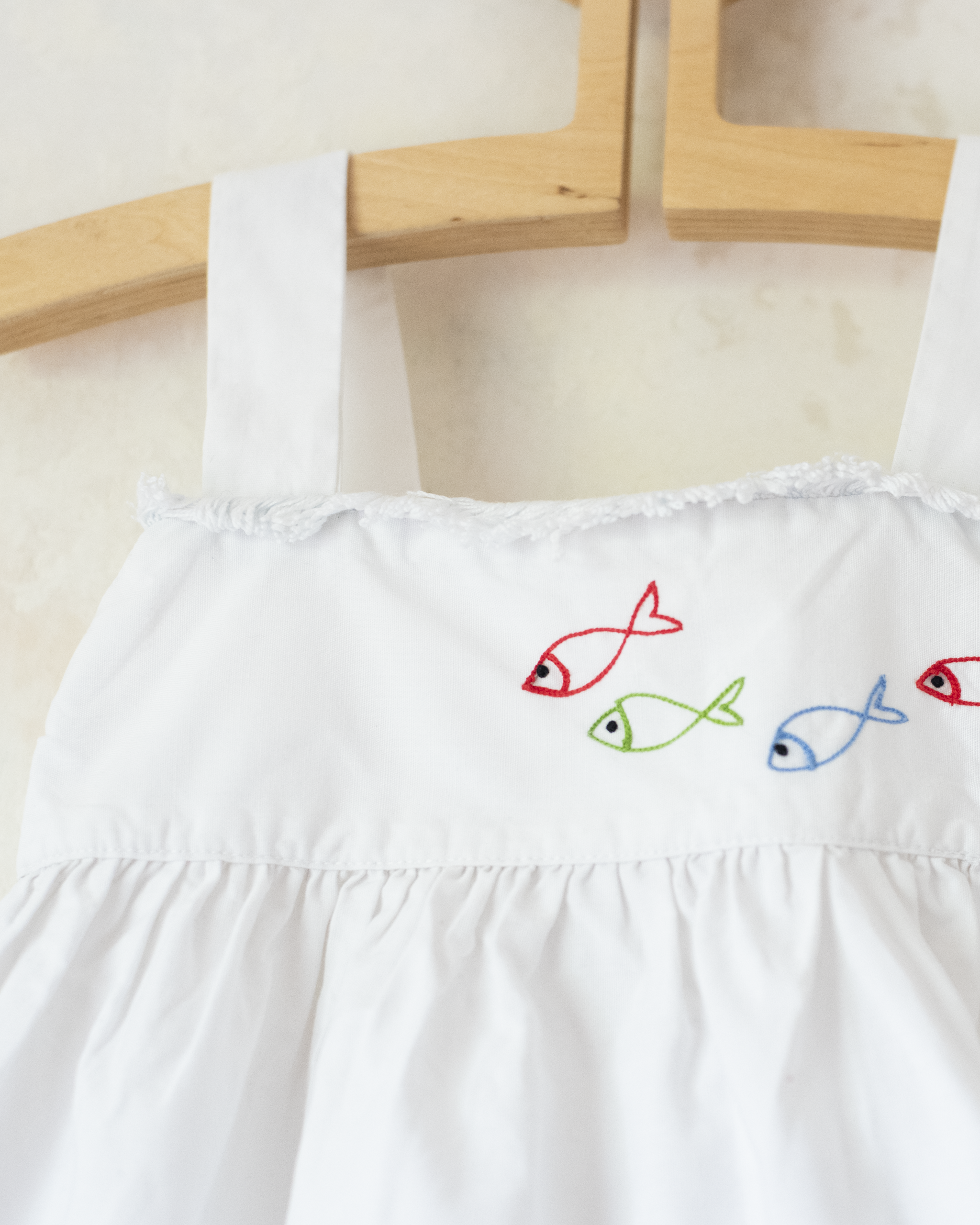 טוניקה צרפתית לבנה עם דגים רקומים | 9-18 חודשים