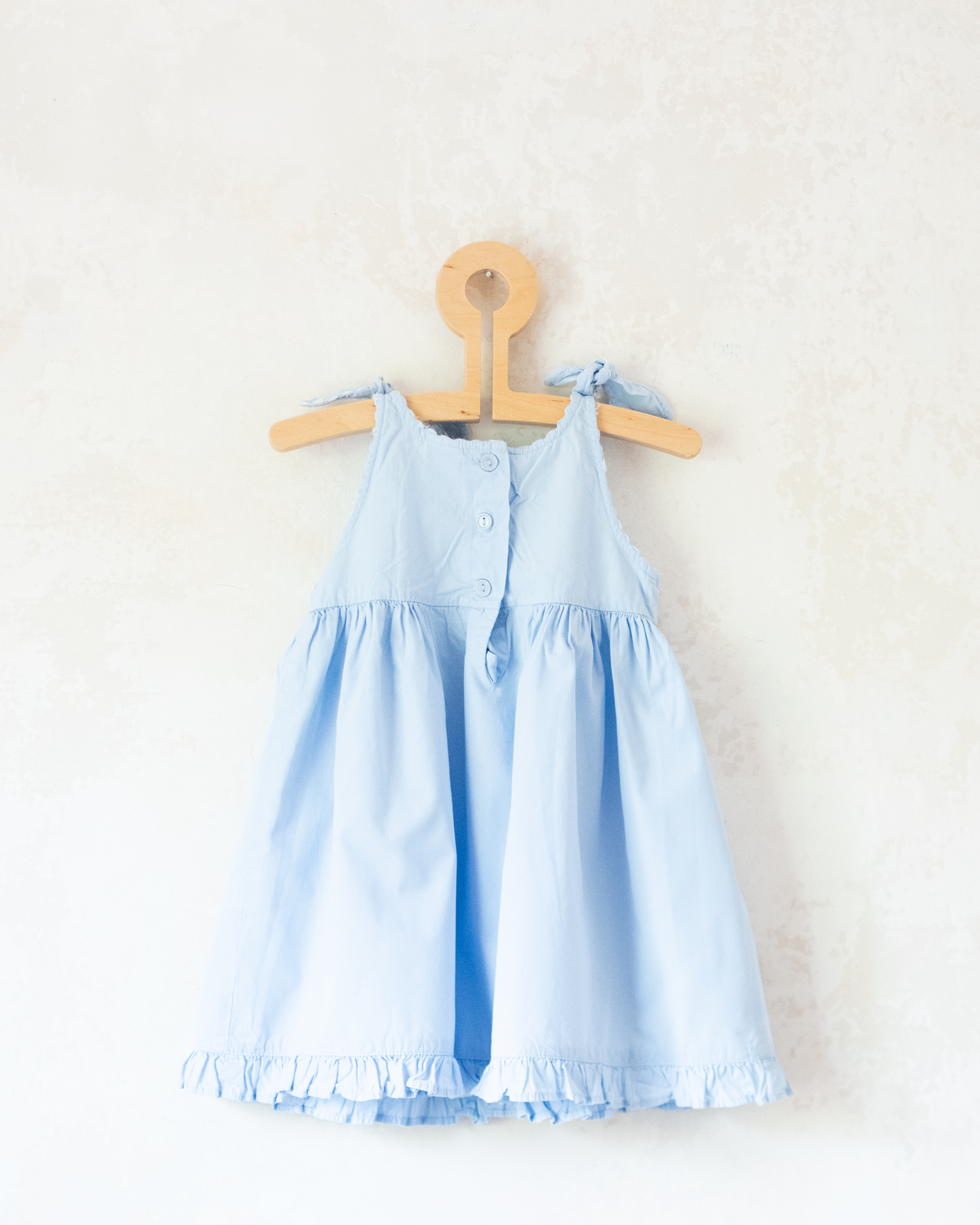 Light-blue dress with embroideries of King Babar and butterflies | 12-18 months