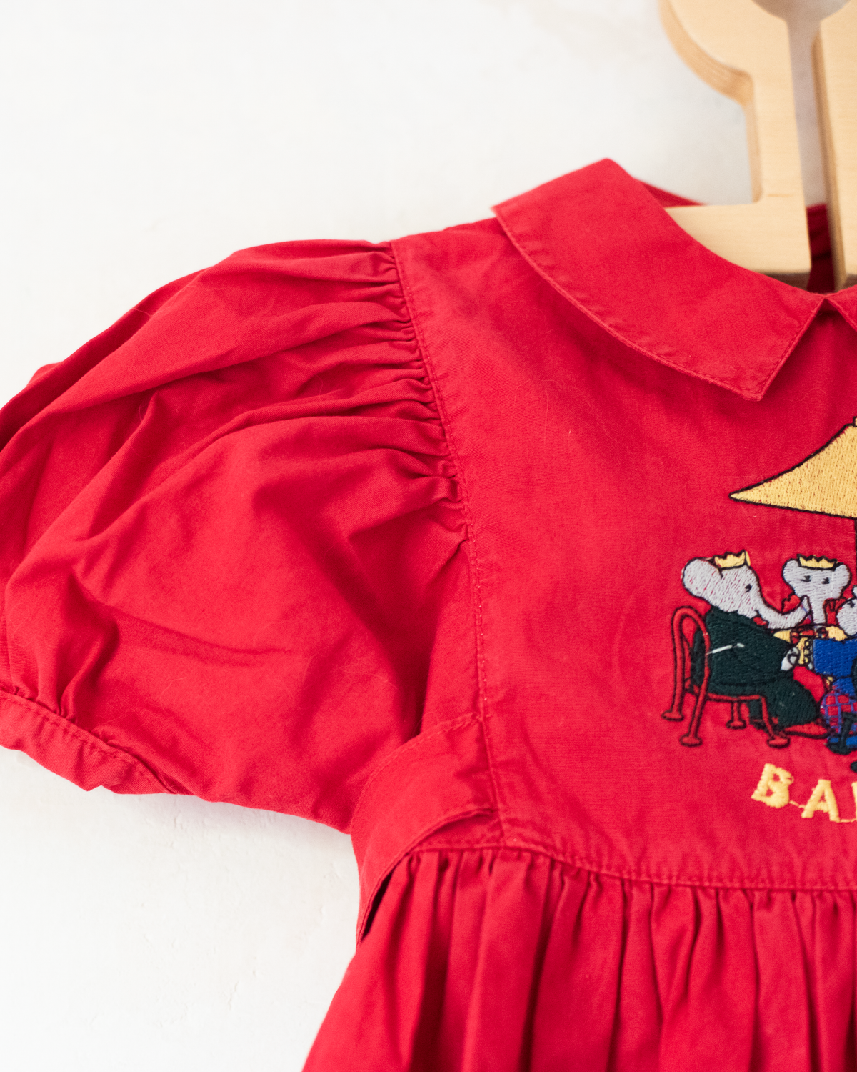 Red overall with Babar the King embroidery | 9-12 months