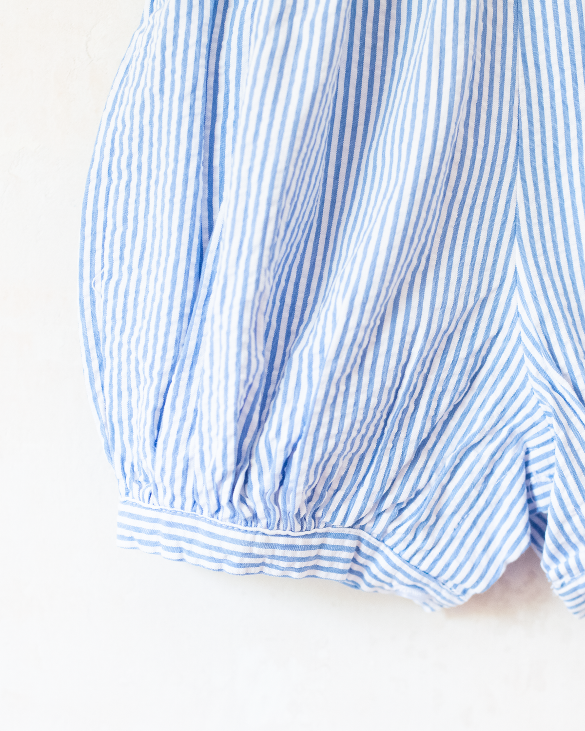 Striped romper with embroidered boats | 3-6 months